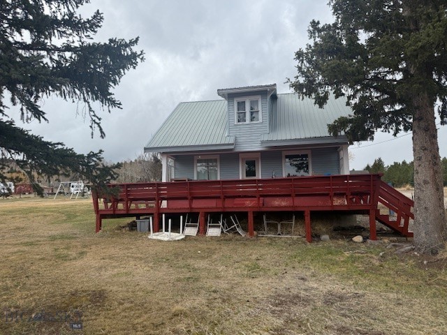 Enjoy the tranquility of Montana living with this charming 3-bedroom, 1-bath home set on a full acre just southwest of Anaconda. Built in the early 1900s, this home offers timeless character with wood siding and a durable metal roof. Step out onto the spacious front deck and take in the fantastic views that surround the property.

The partially fenced yard provides space for pets, gardening, or outdoor activities, while the small garage and newer storage shed offer added convenience. With city water, private septic, and a quiet neighborhood setting, this property is ideal for those seeking peaceful country living with practical amenities.