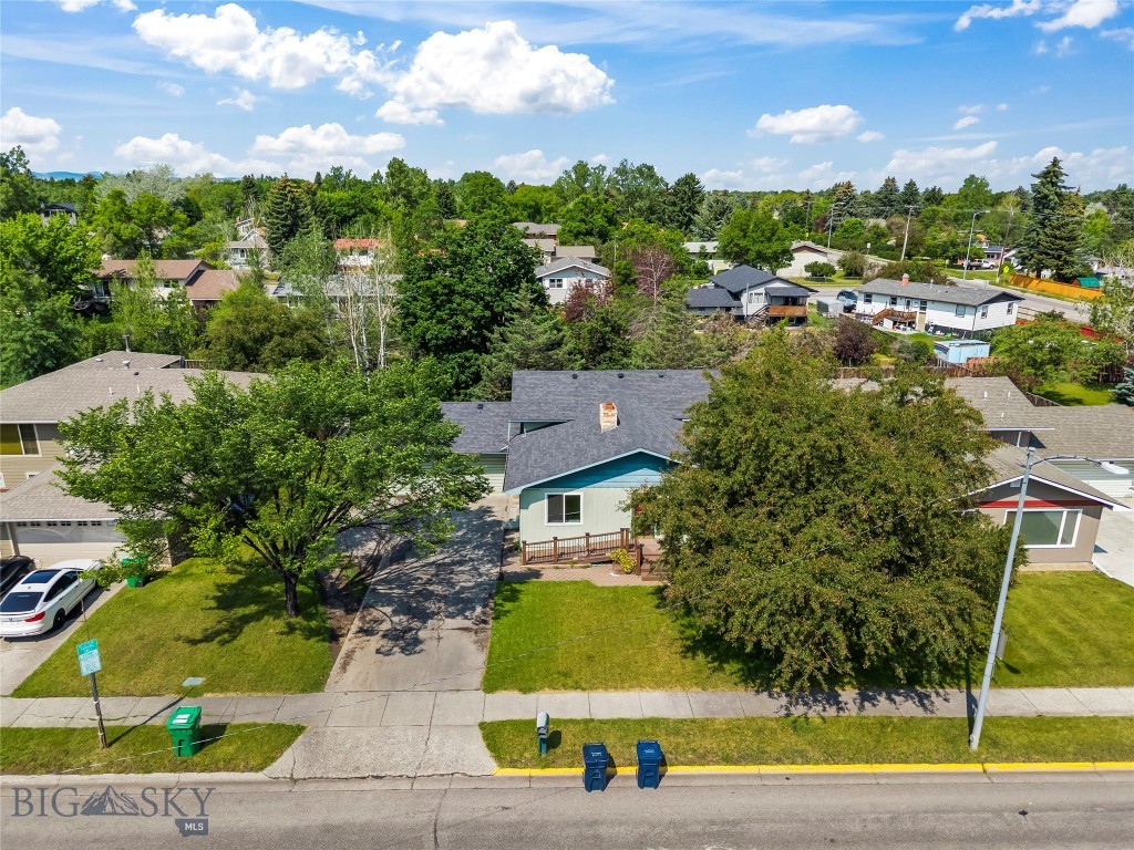 Come check out this spacious 4-bedroom, 2.5-bath home in one of Bozeman's most convenient locations. It would be hard to find a more central spot, with Bozeman High School, Montana State University, downtown, shopping, dining, parks, and recreation all in close proximity. Featuring two separate living areas, there's plenty of space to entertain or relax. Outside, you'll find a majority fenced backyard along with abundant off-street parking in addition to a spacious attached 2 car garage. Recent updates include new carpet and beautifully refreshed bathrooms, making this home move-in ready. Whether you're looking for a primary residence or an investment property, this home offers an outstanding combination of location, space, and value.  Call your agent to set up a showing!