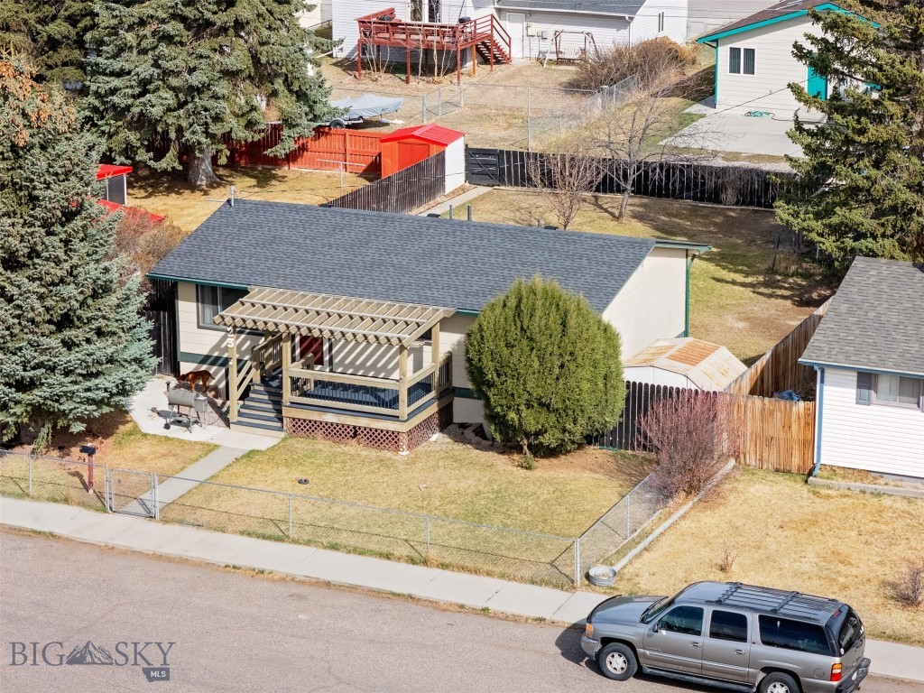 This is the perfect opportunity for a family home in a great neighborhood in Dillon! This home is move in ready and is very close to Dan Ibey Memorial Park, Beaverhead Golf Course and baseball fields. Enjoy 4 bedrooms and plenty of family room with a bathroom on each level. A perimeter fenced yard with mature landscaping and lawn offer ample space for your fur covered family members.  This really is an opportunity to jump from renting and into home ownership! Call and set up a visit to see your next comfy abode!