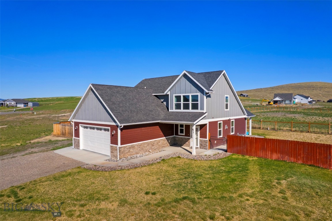 Enjoy sweeping mountain views from both the inviting front porch and the covered back patio of this spacious, thoughtfully designed home. Offering 4 bedrooms and 2.5 bathrooms, the open-concept great room features a cozy fireplace and plenty of space for relaxing or entertaining.

The eat-in kitchen blends style and functionality with a center island, stainless steel appliances, quartz countertops, solid cabinetry with 42” upper cabinets, and soft-close doors and drawers. The main-floor primary suite serves as a private retreat, complete with a walk-in closet and an ensuite bathroom featuring dual sinks, granite countertops, a separate soaking tub, and a tiled shower.

Additional interior highlights include a generously sized main-floor laundry and mudroom, LifeProof luxury vinyl plank flooring throughout the living areas, kitchen, and bathrooms, plush carpet in the bedrooms, and oil-rubbed bronze fixtures throughout the home.

Outside, the established yard is equipped with an underground sprinkler system, a chicken coop, and an insulated dog kennel with an attached dog run, ideal for keeping pets comfortable year-round.Please note: the home has known foundation issues that can be remedied. Disclosures outlining recommended repairs are available, and the property is being sold as-is. Pricing reflects the work needed to bring the foundation up to standard. 

With its functional layout, quality finishes, and stunning mountain views, this property offers exceptional potential and is an opportunity you won’t want to miss.