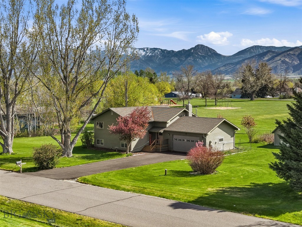 Welcome to 252 Cirque Drive, a beautifully maintained Bozeman property situated on 1.046 acres backing to Mountain View Subdivision's 5 acre park. Located in a quiet and desirable setting. Backing directly to the park, this home has NE Views of a large portion of the Bridger Mountain Range. 252 Cirque truly has a combination of privacy, open space, and convenience, as it is only 6 Minutes to the airport and 7 Minutes to Costco/Target. 
Enjoy seamless indoor-outdoor living with a walk-out basement backyard patio, perfect for relaxing or entertaining, plus a large deck off the kitchen overlooking the wide open views, and peaceful surroundings. 
This property has been well cared for and offers a comfortable, inviting feel throughout. Located on a quiet street with generous outdoor space and park-like views, this is a special Rural Bozeman opportunity you won’t want to miss.