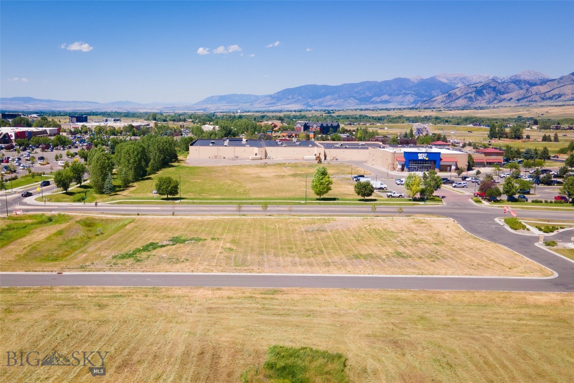 Exceptional commercial development opportunity just off Bozeman’s primary retail corridor, North 19th Avenue. This 1.51 acre lot sits in the heart of Bozeman’s thriving commercial hub, surrounded by national retailers including Target, Costco, Ross, Best Buy, & WinCo Foods. Ideal for a variety of retail or service based uses with high visibility and easy access. Don’t miss this rare chance to plant your flag in one of Montana’s fastest growing markets.