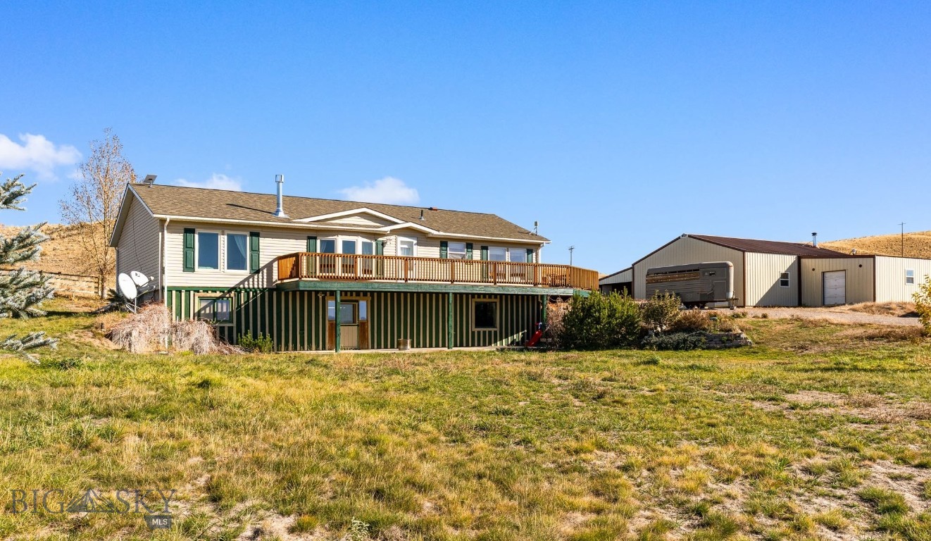 Horse property close to Dillon, MT! Situated on 10.45+/- fenced acres, this 3,136 sqft Montana home offers 3 (almost 4) bedrooms and 2 bathrooms with room to grow. The main level features updated vinyl tile flooring, large windows and a bright living area warmed by a gas stove. The kitchen flows well with plentiful cabinet storage, pantry, gas range and a charming antique cook stove. Direct access from the living room and kitchen leads to the large wrap-around deck to BBQ or simply taking in the mountain and rural views under the big sky! The primary suite includes a large soaking bath, dual sinks, 3/4 shower, closet and sliding glass door to a private porch in the backyard. Two additional bedrooms, a full bath and a dedicated laundry room round out the main level.

Downstairs, the unfinished walkout basement is a blank slate with exceptional potential to expand the living space. Even better? The basement already has a future 4th bedroom sheet-rocked in with a 3rd bathroom and mechanical room framed in, simply waiting for a new owner to finish with their own style. This versatile area could be finished with a home gym, hobby space or entertainment room. Tailor it to fit your lifestyle, enjoy the warmth of the wood stove and enjoy the walk out basement patio area.

Outside, this property is set up for practicality and animals. The 2-car garage is filled with options with 2 separate, attached shop spaces totaling approximately 1,586 sqft. These spaces are perfect for vehicles, equipment, storage or year round projects. An additional lean-to includes a tack area and small chicken coop. 

Additionally, an RO drinking water system was installed in 2025, the septic system was pumped and inspected in 4/2025, has an updated roof and an underground sprinkler system for easy yard maintenance.

Located just minutes from Dillon, this acreage home offers privacy, space and convenience. Whether you’re looking for a horse property, hobby farm, or a home with a shop and room to grow, this property combines practicality and comfort in the heart of SW Montana.