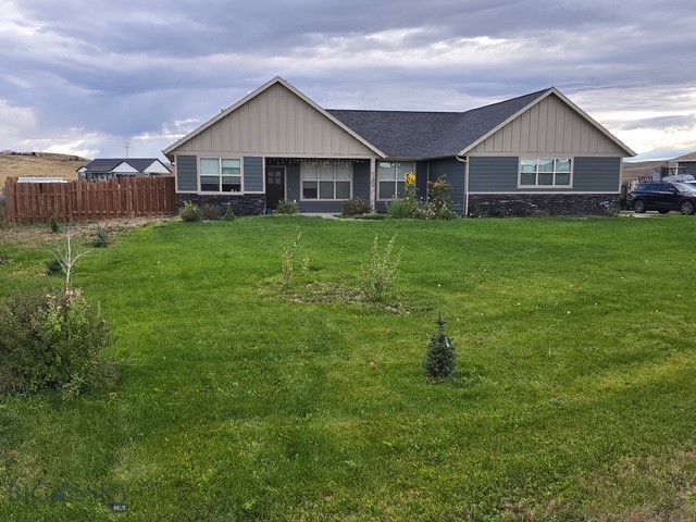 Do you want your home to feel like a retreat? Where you have room to breathe and space for a garden and a fire pit under the stars? This is your chance! Set on over an acre in the quiet countryside, this single-level 3 bedroom, 2 bathroom paradise offers stunning mountain views and a large backyard oasis. As you enter, you’ll be welcomed by a sweeping living room complete with a cozy fireplace, durable luxury vinyl plank flooring, and an open concept kitchen - offering plenty of cabinet space and easy access to the back patio. The primary suite includes plush carpeting, and a well-appointed bathroom with two individual vanity stations, granite countertops and a large tub. Two additional bedrooms and full bathroom make this home practical and inviting. Enjoy a thoughtfully designed outdoor space featuring a fully fenced backyard with a dedicated dog run, perfect for pet lovers and their furry friends. The fire pit creates an inviting setting for gathering with friends and family, while the storage shed offers practical space for tools and equipment. Additional features include an insulated two-car garage, insulated door and keypad entry for convenience, a buried 1,000-gallon propane tank and front yard underground sprinklers, and top of the line reverse osmosis water system. For buyers seeking space, quiet surroundings, and the freedom that comes with a larger lot, while still being within easy reach of Three Forks schooling, Bozeman, and Helena. This property presents a compelling opportunity to enjoy the best of Montana living. Schedule your private showing today!