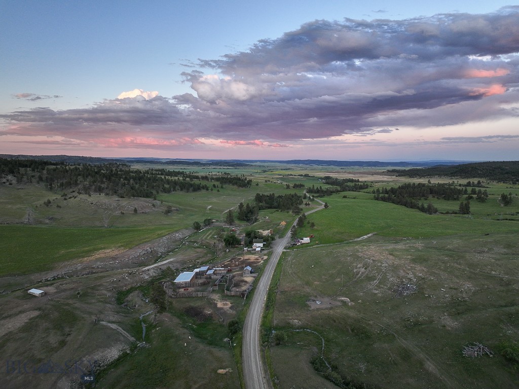The Stagecoach Trail Ranch was once a corridor in the old west providing passage to travelers from Billings to
Bozeman. Today this hunter’s paradise also serves as a major corridor for wildlife between two large land holdings that harbor herds of Elk, Mule Deer and Antelope. Not only does it offer the aforementioned species but, also, it offers black bear, turkey, upland birds, and mountain lion.
The two parcel property consists of 1,280 +/- acres in total. Of this contiguous two section ranch, there is 160+/- acres of dryland hay acreage with the remainder being lightly timbered filled draws and hills. The property gains elevation from east to west with spring fed tributaries carving out draws to the center of the property where the stagecoach trail was once located.
The old stagecoach trail is now part of the county road where the two seasonal tributaries flow towards until meeting the Deadman’s Creek that flows west to east throughout the main property.
In it’s current capacity it is a working ranch maintaining a balance of smaller ruminants and cattle. The headquarters of the ranch features the main 16’x80’ 3B/2B modular home, homestead, barn, 7 additional outbuildings, and corrals. Additionally, there is a 2023 16’x80’ 3B/2B modular home at the eastern border of the property. 
The Stagecoach Trail Ranch offers a multitude of opportunities at big and small game. It has historically
been maintained as a self sustaining, easily ran livestock operation with adequate improvements. It is
easily accessible 12 mile drive via the Greycliff exit from Interstate 90 to the headquarters of the ranch or
9 miles from Reed Point, MT. The old stagecoach trail is now the maintained county road that bisects the
property running east to west. The road and trail systems on the ranch offer ease of access to traverse the
terrain. Following the county road is the Deadman’s Creek that runs throughout the property nearly year
round. The topography, springs, and surprisingly diverse terrain of this contiguous holding enable it to
thrive as a wildlife oasis that is situated between two large estates. To complement this, it also excels with
its locale, has ease of access, terrain, and water. This ranch affords a unique opportunity to own a
productive hunting property in South Central Montana. Come join us for a tour of the Stagecoach Trail
Ranch in “The Best Last Place”.