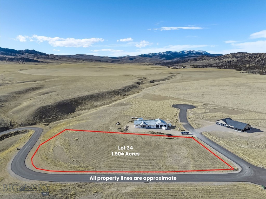 Lot 34 offers 1.90± acres within a thoughtfully planned 55-lot community, with parcels ranging from approximately 1 to 2 acres. The subdivision spans 165± acres total, providing generous open space and excellent opportunities to enjoy local wildlife. Paved roads are in place, with mailboxes, power, and fiber optic service to each lot. Located approximately three miles from downtown Ennis, this property offers sweeping views in all directions and convenient access to town amenities. Wells throughout the subdivision range from approximately 200 to 350 feet in depth, producing 12 to 60± GPM. The licensed Montana listing agent is a member of the selling entity & can only represent the seller.