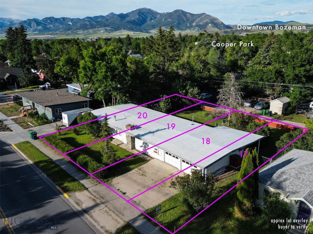 A prime opportunity to design and execute your development vision in desirable downtown Bozeman. A rare redevelopment opportunity, this unique property includes four city lots and 100’ of frontage on S 11th. The lots together total 11,900 sq ft and are located just blocks from MSU, Coop, Cooper Park, shopping, services and amenities. According to city online maps, this property is zoned RA which allows for a multitude of new build options. Structure on property is not in habitable condition and is sold  ‘as is’.  Located just three blocks from MSU, these parcels feature both roadway and alley access. Water, sewer, gas and power are to the property. Property lathes are estimated corner locations set by a surveyor – pins are not set. Buyer to verify all information and potential current and future uses independently and to their own satisfaction.