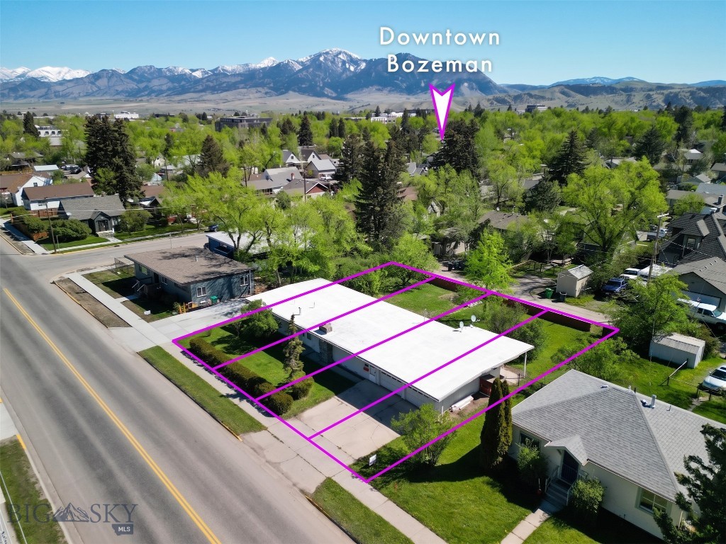 A prime opportunity to design and execute your development vision in desirable downtown Bozeman. A rare redevelopment opportunity, this unique property includes four city lots and 100’ of frontage on S 11th. The lots together total 11,900 sq ft and are located just blocks from MSU, Coop, Cooper Park, shopping, services and amenities. According to city online maps, this property is zoned RA which allows for a multitude of new build options. Structure on property is not in habitable condition and is sold  ‘as is’.  Located just three blocks from MSU, these parcels feature both roadway and alley access. Water, sewer, gas and power are to the property. Property lathes are estimated corner locations set by a surveyor – pins are not set. Buyer to verify all information and potential current and future uses independently and to their own satisfaction.