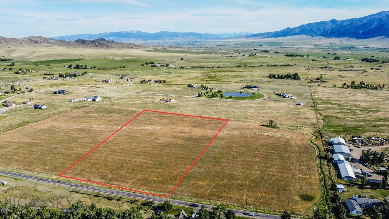 The perfect lot in the perfect location to make all of your dreams come true. Discover this exceptional opportunity with this irrigated lot, perfectly suited for agricultural endeavors or a sprawling private estate. This property boasts abundant resources, ensuring robust capabilities essential for homesteading, farming or landscaping. The fertile soil and ample space offer immense potential for various crops, livestock or development of your dream home. Imagine cultivating your own produce or creating your own sanctuary with plenty of room to grow. The lot is a blank canvas for all of your aspirations. Situated in a desirable location, this lot provides a harmonious blend of rural tranquility and convenient access to local amenities. This is a rare chance to acquire substantial, read-to-use acreage and live the Montana dream. Wheel line irrigation pipe to convey with property.