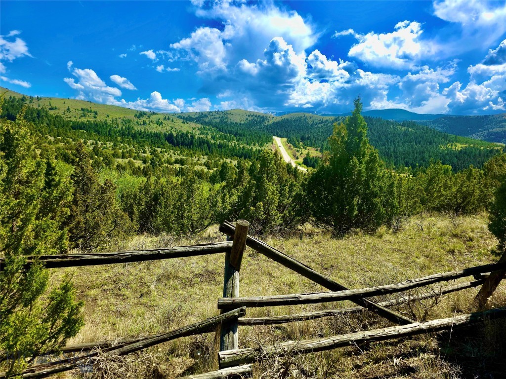 Strike it rich with a whole lot less effort! Prospectors once flocked to Alder Gulch for gold — now you can claim your own piece of Virginia City history for a whole lot less effort. This 1.3-acre parcel sits in Montana's most storied ghost town, where the Wild West isn't just a memory — it's your backyard. Accessed by an unmaintained two-track dirt street, the lots offer a quiet, off-the-grid retreat with sweeping views of the surrounding hills and ranges. Pitch a tent and camp beneath some of the darkest, most star-filled skies in the country — camping is welcome for stays of up to two weeks at a time. Step out your tent and into a year-round playground. Cast a line on the blue-ribbon Madison River, renowned for its trophy brown and rainbow trout, or head to the 4,800-acre Ennis Lake to fish, boat, or raft the Bear Trap Canyon. Hunt in District 320 and explore the 3.32-million-acre Beaverhead-Deerlodge National Forest, home to elk, mule deer, bighorn sheep, mountain goats, and more. Hike the surrounding ridgelines, soak in the mineral waters of Norris Hot Springs, tour Lewis and Clark Caverns, or take an easy day trip to Yellowstone National Park, just 125 miles away. In winter, world-class skiing awaits at nearby Big Sky and Bridger Bowl. Sweeping mountain views, endless recreation, and a jaw-dropping price mean the real treasure here isn't underground. It's the land itself.