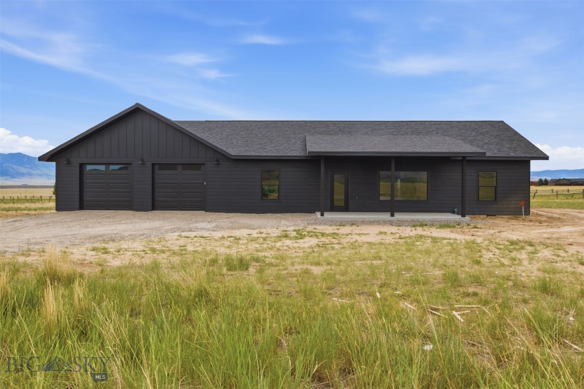 Enjoy the convenience of new construction paired with the beauty of Madison Valley living. This thoughtfully designed 1,465± SF home offers 3 bedrooms, 2 bathrooms, an attached 2 car garage, and covered front and rear porches to take in the surrounding views and Montana sunsets. The open floor plan creates a comfortable flow for everyday living and entertaining. Located in Shadow Ridge, residents enjoy paved roads, community mailboxes, and generous open space throughout the subdivision. Just minutes from downtown Ennis, you'll have easy access to local restaurants, shopping, and services while remaining close to the outdoor recreation that makes this area so desirable. The world-renowned Madison River, public lands, hiking trails, hunting, and endless opportunities for fishing, boating, and exploring are all nearby. Whether you're looking for a full-time residence or a Montana getaway, this new home offers the opportunity to enjoy Big Sky Country with modern comforts and low-maintenance living. The licensed MT listing agent has an ownership interest in the property & can only represent the Seller. Taxes are on land only & subject to change.