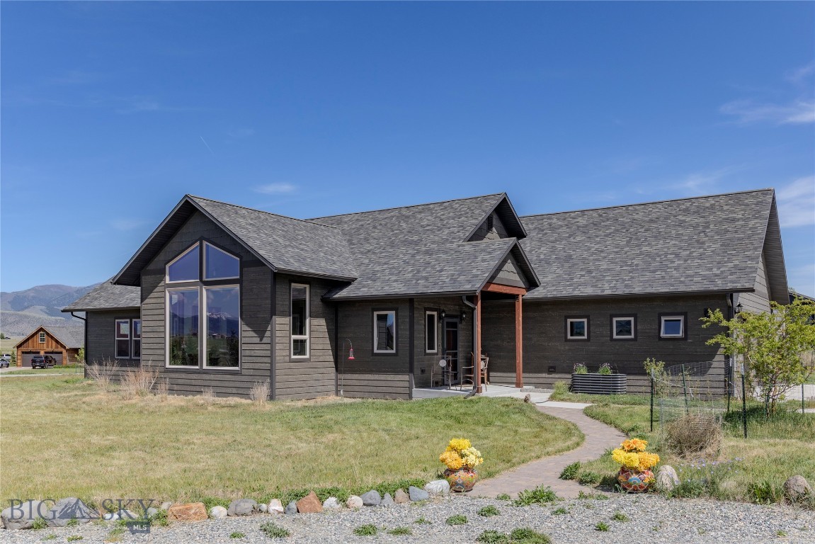 Welcome to 34 Obsidian Road, a 2020 custom-built Montana home on 2 acres in Paradise Valley, with sweeping views of the Absaroka-Beartooth and Gallatin Mountain Ranges and the surrounding valley. Large windows, vaulted ceilings, and outdoor living spaces were used in the custom design to make the most of that setting and bring in natural light throughout the day. Inside, the floor plan offers 2 bedrooms, 2.5 baths, 2,087 sq ft, and a comfortable open kitchen, dining, and living area. The layout also includes an office/flex room with leaded glass French doors, 2nd bedroom/studio/flex room with French doors to the back deck, laundry/mechanical room, generous storage, custom built-in pantry, and an oversized finished attached garage. Quality and efficiency were important parts of the build, including above-code insulation, LP Smartside composite siding, 4-zone radiant floor heat, an HRV system, double-pane windows, 3 ceiling fans, cellular blinds, solid wood doors, an induction stove-top in the kitchen, soft-close cabinetry, luxury vinyl plank flooring, custom wood trim throughout (including in garage), and a high-efficiency propane boiler. Outside, the property includes a 2025 Trex deck, covered outdoor living space, native bird-friendly landscaping, and a drip irrigation system and a connection to the Mill Creek irrigation system. It all comes together as a comfortable, newer home with room to breathe, strong design, and convenient access to Livingston, Chico Hot Springs, the Yellowstone River, and Yellowstone National Park.