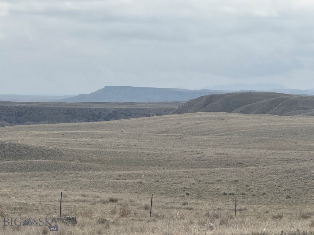 Seize the opportunity to buy a piece of affordable Montana acreage. Enjoy over 5 acres on the edge of an authentic MT town: rural Augusta, MT! The property offers butte and mountain views, an existing septic AND a dug well. The area is well-known for hunting, plus fishing in nearby Willow Creek Reservoir, the Sun River and Nilan Reservoir and with close proximity to the famed Rocky Mountain Front. There is a scattering of homes in the subdivision. Covenants exist, but are not enforced, so no HOA. Dirt roads, but this acreage is first off the county road, so smooth access. There is a shell of an old manufactured home and a loafing shed. Electricity to the lot. Year round and insurable access, so you can take advantage of it as a primary residence or use it recreationally.