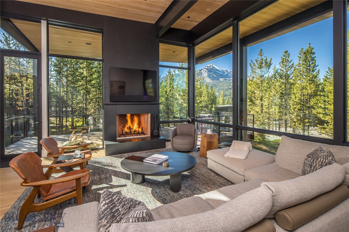 Embrace Montana’s wild beauty this winter with this fully furnished One&Only Moonlight Basin Private Home, a luxurious retreat crafted to harmonize with nature’s beauty. This five-bedroom, 3,670-square-foot residence merges contemporary elegance with rugged mountain charm, seamlessly integrating with the breathtaking surroundings of Big Sky’s wilderness and iconic peaks. Floor-to-ceiling windows invite expansive views of the snow-capped mountains, filling the home with natural light and a deep sense of tranquility. Impeccable finishes, lovely furnishings and art throughout, cozy fireplaces, and stunning outdoor spaces make this a sanctuary of both sophistication and comfort—a perfect retreat for family gatherings or intimate escapes.
Ownership here extends beyond the home, offering privileged access to exclusive amenities through Moonlight Basin Club and One&Only Moonlight Basin. Experience world-class skiing with ease through your private ski locker and direct Gondola access from One&Only Sky Lodge and Big Sky’s Madison Village, a private Jack Nicklaus Signature Golf Course, and miles of hiking/biking/Nordic trails that wind through the breathtaking terrain. Delight in lakefront activities, from paddleboarding and canoeing to serene fly fishing. In winter, enjoy snowshoeing, cross-country skiing, and convenient access to the world class skiing at Big Sky Resort, while year-round, the One&Only spa and wellness offerings ensure rejuvenation and relaxation. With exclusive dining experiences, concierge services, and an array of thoughtfully curated adventures, this private home is more than a residence—it’s an invitation to experience the best of Montana’s unparalleled luxury and adventure.