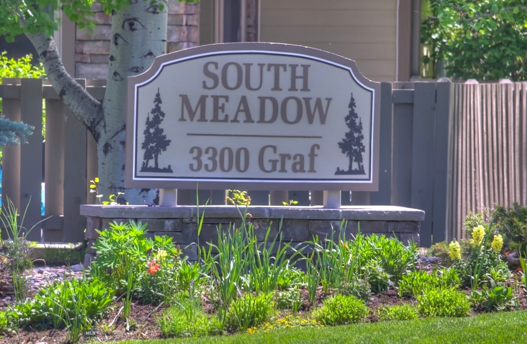 First and only owner of this condominium at South Meadow Condominiums.  This unit was selected by this owner prior to its completion due to the spectacular location in the complex.  New Heating and Air Conditioning system to be installed by no later than June 30 by Monarch!  All inspection items have been or will be taken care of by no later than June 30! The huge green space behind the unit looks over Sourdough Trail, beyond Valley View Golf Course and beyond that there is a view of one home between this unit and the Bridger Mountains. Truly.......THE location in the complex.  Besides the split bedroom floor plan and the eat-in kitchen with island, the unit offers Cherry cabinetry (and a lot of cabinet space), hardwood floors, a custom built-in curio cabinet, central vacuum system and central air conditioning.  South Meadow Condominiums is a very sought after complex with no other units on the market at this time.  Hurry........this won't last long!! All furniture to convey or NOT!!!  If the buyer doesn't want the furnishings, it will be vacant by closing!