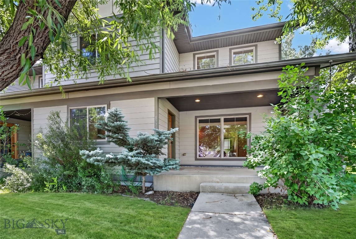 From the cute covered front porch, step inside to a bright and inviting main level filled with incredible natural light and soaring ceilings that create an open, airy feel. The spacious living area is anchored by a cozy fireplace and flows seamlessly into the well-sized kitchen, complete with a large pantry and plenty of storage. A convenient powder bathroom and attached garage round out the main level. Upstairs, the open railing overlooks the living space below, enhancing the home's spacious feel. You'll find three bedrooms on the second level, including a primary suite with its own private bathroom, along with two additional bedrooms that share a full bath. Outside, enjoy mature landscaping and an unbeatable Bozeman location with convenient access to parks, trails, schools, shopping, dining, and everyday amenities, making it easy to enjoy everything Bozeman has to offer.
