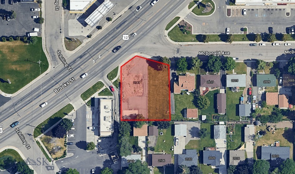 Prime high-visibility commercial land available for lease in Missoula's Brooks St corridor. Lot is 14,127 sqft. Located at 2141 McDonald Avenue, this site benefits from an Annual Average Daily Traffic count of 21,737, offering excellent exposure for your business. The property is situated in a thriving commercial corridor with neighboring national and local businesses, providing strong customer draw and accessibility. Offered at $6,500 per month plus NNN, with an annual rate increase of 3%, this lot is ideal for retail, food service, or other commercial uses seeking a central, well-traveled location. East boundary of lot is next to drive way of home at 2101 McDonald. West boundary is fence next to Taco Bell.