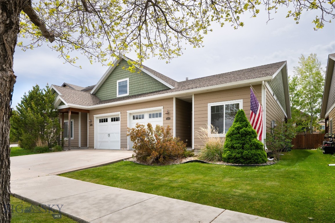 Located on a neighborhood park in Bozeman’s Traditions Subdivision, this beautifully maintained single-level townhome offers comfort, convenience, and thoughtful upgrades throughout. Cambria countertops and stainless steel appliances create a warm yet sophisticated feel. Brand new manufactured wood flooring throughout makes this home move in ready! The open-concept layout features a spacious kitchen with a large pantry, breakfast bar seating, and seamless flow into the dining and living areas. The vaulted primary suite offers a generous walk-in closet and private bath, while the dining area opens to a covered patio and fully fenced, landscaped backyard—perfect for relaxing or entertaining. Enjoy direct access to green space and walking paths right outside your door in one of Bozeman’s most convenient locations.
