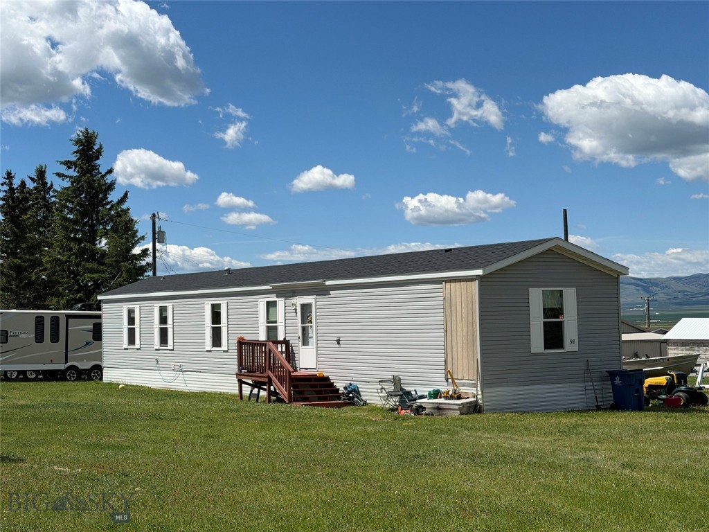 If you are looking for a bit of space in the city limits of White Sulphur Springs this may just be the property for you!  This 2013 mobile home is on a 12,894 square foot lot 2 blocks from Arrowhead Meadows Golf Course.  The neighborhood is quiet and you will often see golf carts buzzing back and forth to the golf course.  3 bedrooms, 2 baths, spacious kitchen and open floor plan.  There is plenty of room to build a garage on the property.  Meagher County is known for its vast amount of outdoor recreational opportunities.  This property could be your forever home or your getaway home to come enjoy the outdoors, the local hot springs, wonderful eateries, and the local brewery.