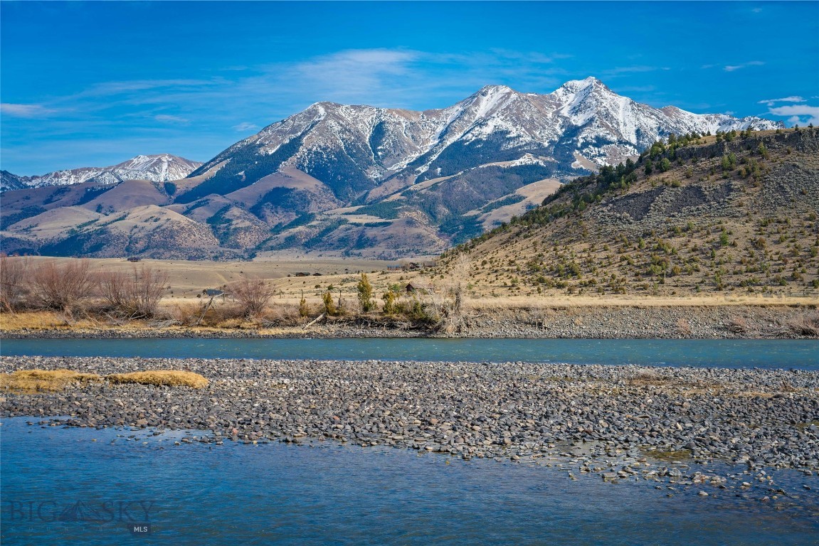 What do you think of when you think you want to own land in Montana? Is it jawdropping views of majestic mountains? Is it your own personal river frontage? Is it room to spread out and own your own slice of paradise? Well if so, then you have come to the right property!!!
This property is on over 24 acres, borders the Yellowstone River, and has the most amazing views of the Absaroka mountains as a backdrop to your paradise. Less than 30 minutes to the bustling town of Livingston to the North and 25 minutes to Gardiiner, which is home to the North entrance to Yellowstone National Park.
This lot could be combined with lot 5 which is over 29 acres, to really expand your Montana Dream Property.

These types of properties do not come along that often. Call your favorite Realtor ASAP.