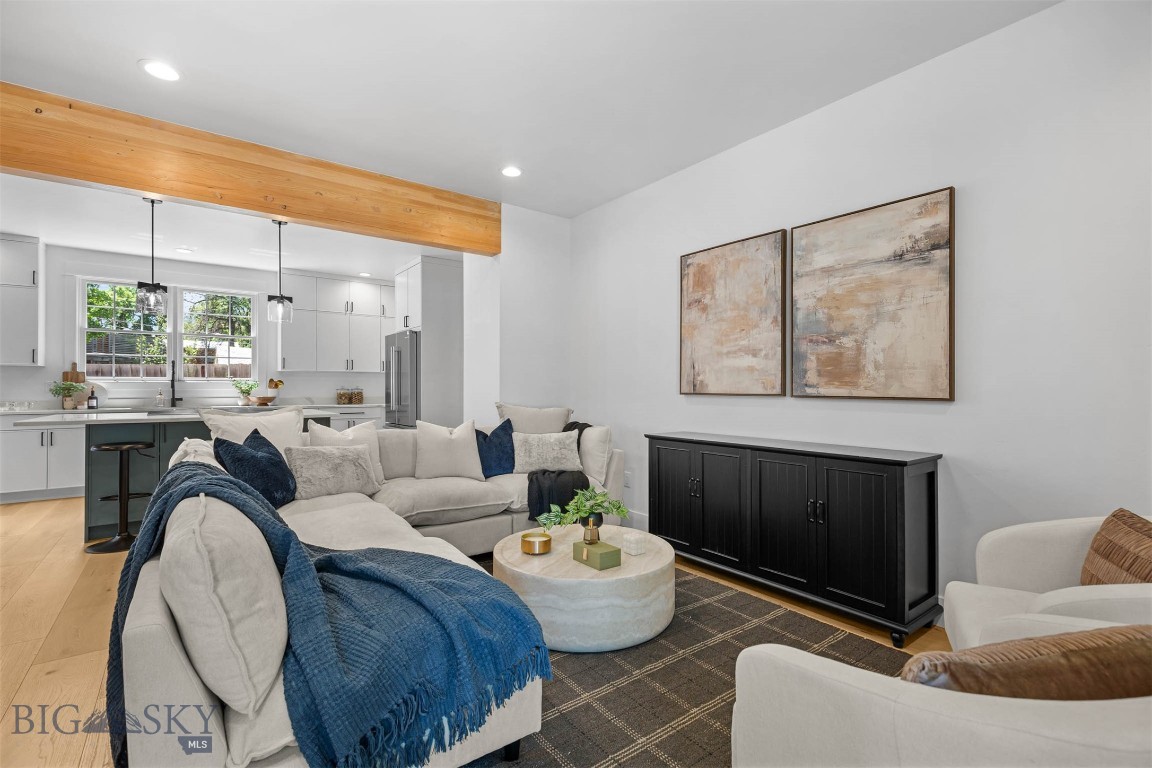 Just six blocks from Main Street and on a park, this beautifully updated home combines the convenience of downtown Bozeman with exceptional Bridger Mountain views. Designed for comfortable main-level living, the home features the primary suite, kitchen, laundry, and main living areas all on the first floor.
Extensive recent renovations have transformed the home, highlighted by a stunning new kitchen featuring premium Bosch 800 Series appliances, custom finishes, and a modern design. The main-level primary suite has been completely reimagined with an expansive walk-in closet and a spa-inspired en-suite bathroom complete with a soaking tub and a separate tile and glass shower.
Upstairs, you'll find three generously sized bedrooms, each with large closets, along with a spacious bonus room offering flexibility for a home office, media room, or playroom. Fresh paint and new flooring throughout give the home a bright, move-in-ready feel.

Located directly across from Centennial Park, the property enjoys protected open views of the Bridger Mountains, an uncommon feature this close to downtown. An oversized two-car garage with updated overhead doors provides ample room for vehicles, gear, and storage.  Call for your private tour today!