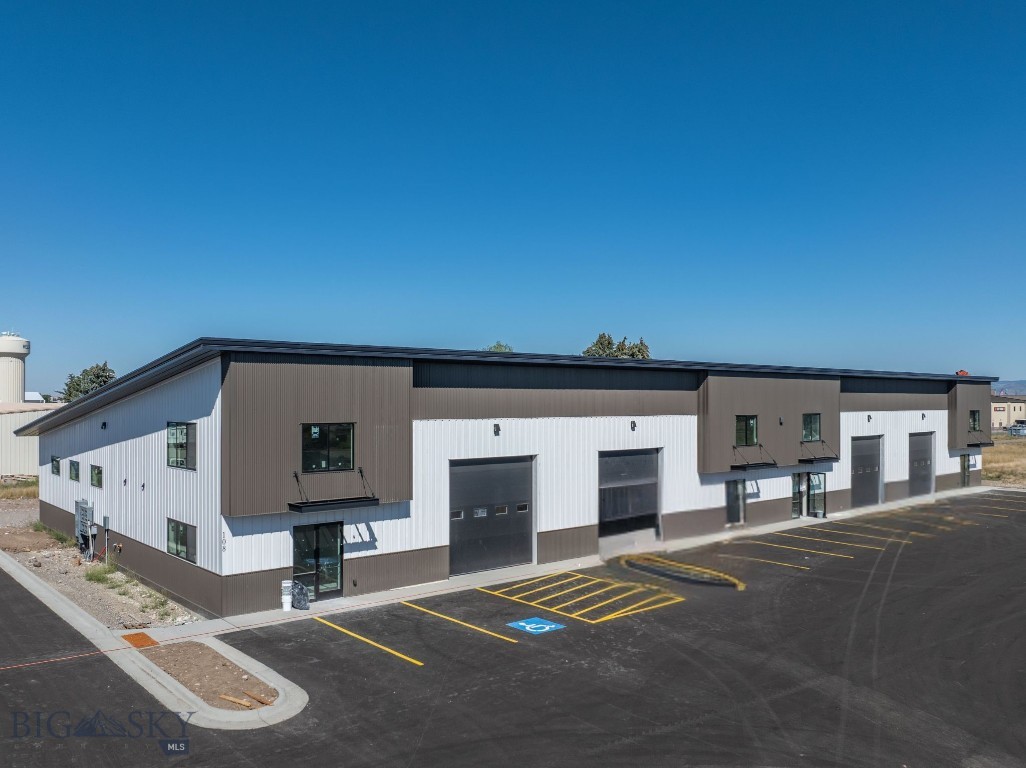 Located within Belgrade’s highly desirable West Post development, this newly constructed 17,600 SF warehouse offers a flexible, high-quality solution for a variety of commercial or light industrial users. Designed with adaptability at its core, the building can be demised into three units, two at approximately 6,500 SF each and one at 4,600 SF, or alternatively into two larger units measuring approximately 6,500 SF and 11,100 SF, allowing for customized occupancy or multi-tenant use. There is approximately 620 SF of upstairs mezzanine space included in this total.

Each space includes a carpeted mezzanine office area ideal for day-to-day operations, 3-phase power, and a private bathroom for staff convenience. The building features multiple overhead doors, including 14-foot front-facing doors for customer or equipment access and 10-foot rear doors for operational efficiency, along with 50 feet of dedicated yard space suitable for outdoor storage, parking, or maneuvering equipment.

A 10% rental discount is available for a tenant occupying the entire building. With quick access to I-90 and Jackrabbit Lane, this modern warehouse offers an excellent balance of accessibility, adaptability, and high-quality construction in one of Belgrade’s most desirable commercial locations.