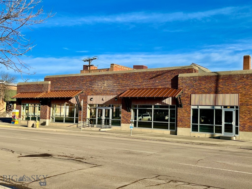 Located in the heart of downtown Great Falls, Montana, this commercial building is situated on the corner of 2nd St. S. and 2nd Ave. South assuring exceptional visibility and attention. The high-traffic location is just inside the Downtown Parking District, so it benefits from the parking advantages. The commercial building is just under 15,000 square feet, with approximately 8,000 sq. ft. of it encompassing the showroom. The large windows supply tons of natural light and allow visibility to the street. In addition, the building has high ceilings, multiple entrances, a floorplan that includes 5 separate offices, 4 bathrooms, a break/conference room, front counter space, an IT room, a copier/office supply room, several storage rooms, and a heated warehouse with an overhead door and street access. The warehouse can serve as private parking as well. Significant upgrades were completed in 2008 including new plumbing, electrical, roof, HVAC, and windows to this 1914 historic downtown gem. From 2008-2022, the building served as a furniture, appliance, and electronics store. A segment of the property (207) could be utilized as a separate business with its own entrance, bathroom, office space, kitchenette, and storage. Think you might need more space? An adjacent warehouse is listed for sale separately at 215 2nd Ave. So. The warehouse is approximately 26,000 sq. feet. The possibilities are endless. As Great Falls grows and the downtown area adds incentive, these buildings are in prime locales to utilize as you see fit.
