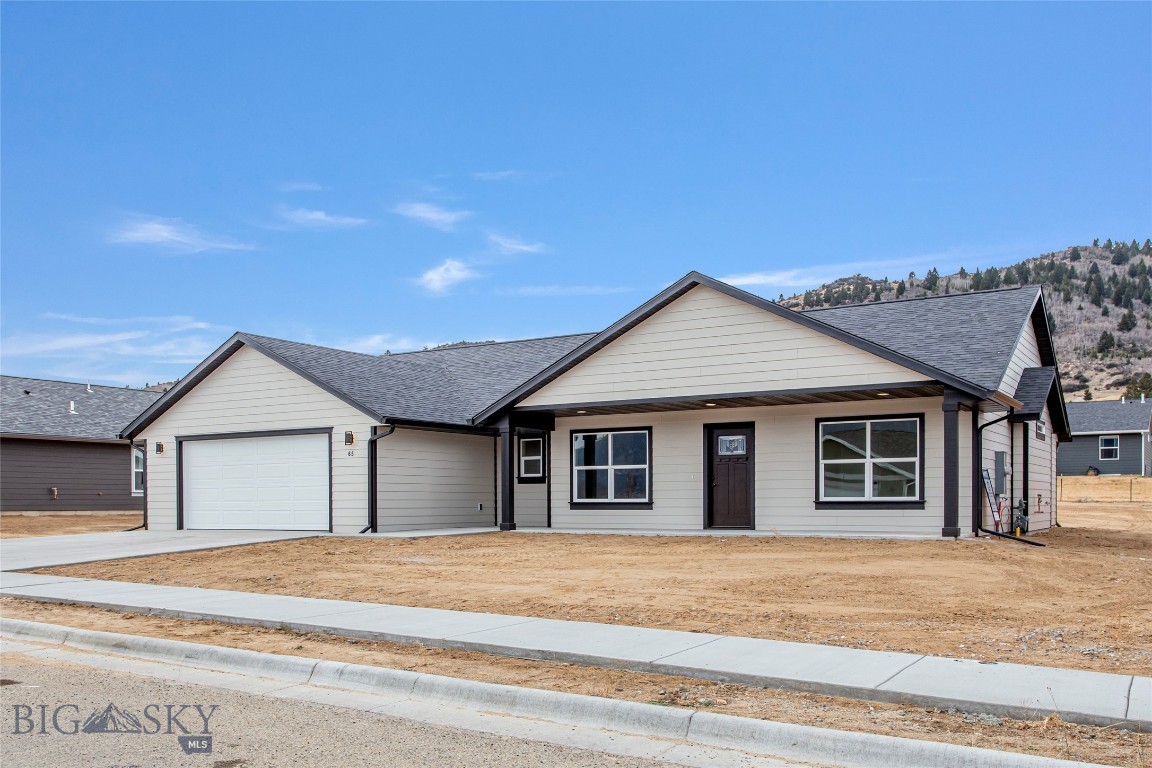 This home is to be built in Copper Fox Estates! Be among the buyers to own a home one of Butte’s newest and most desirable neighborhoods. This thoughtfully designed one-level home offers modern style, quality finishes, and an open-concept layout perfect for today’s lifestyle.

The spacious great room features attractive hardwood laminate flooring and flows seamlessly into the dining area and kitchen, creating an ideal space for everyday living and entertaining. Two additional bedrooms and a full bath are conveniently located near the main living area, offering flexibility for guests, family, or a home office.

The primary suite is designed for comfort and function, featuring a soaking tub, dual vanities, generous storage, walk-in closet, and adjoining laundry area for added convenience. The attached double garage includes an oversized storage room, providing exceptional extra space rarely found in similar homes.

Step outside through sliding glass doors to the patio—perfect for summer evenings, outdoor dining, and relaxing in your new backyard. Currently under construction, this home offers the opportunity to own a beautifully finished new home in a growing community. Don’t miss your chance to secure this exceptional new build before completion! 

NOTE: photos are of similar property