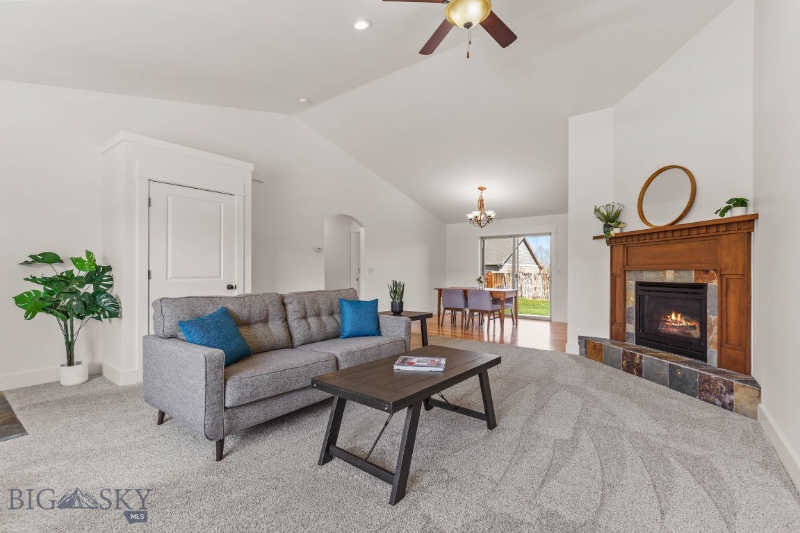 Step inside to an inviting slate entry that opens to a spacious living and dining area, highlighted by lofty vaulted ceilings and a cozy raised hearth fireplace. Fresh new paint throughout the home adds a bright, clean, move-in-ready feel. The well-designed floor plan lives large, offers tons of storage throughout, and provides ideal separation, with the primary suite on one side of the home and three additional bedrooms plus a second full bathroom on the other—perfect for privacy and functionality.

The roomy kitchen is a true centerpiece, featuring stainless steel appliances, granite countertops, abundant cabinetry, and a large pantry to meet all your storage needs. The primary suite offers a private retreat complete with a walk-in closet with built-in closet organizers and an ensuite bathroom featuring a dual sink vanity.

A convenient laundry/mudroom sits just off the attached, heated, two-car garage, which includes 220v power—ideal for projects or additional equipment—while providing additional storage and everyday functionality. The home is also equipped with a tankless water heater for efficiency and on-demand hot water.

Situated on a nicely sized lot in a desirable neighborhood, the property includes underground sprinklers, a fully fenced backyard, a storage shed for added convenience, and a relaxing back patio with hot tub hookups—ideal for enjoying Montana evenings.