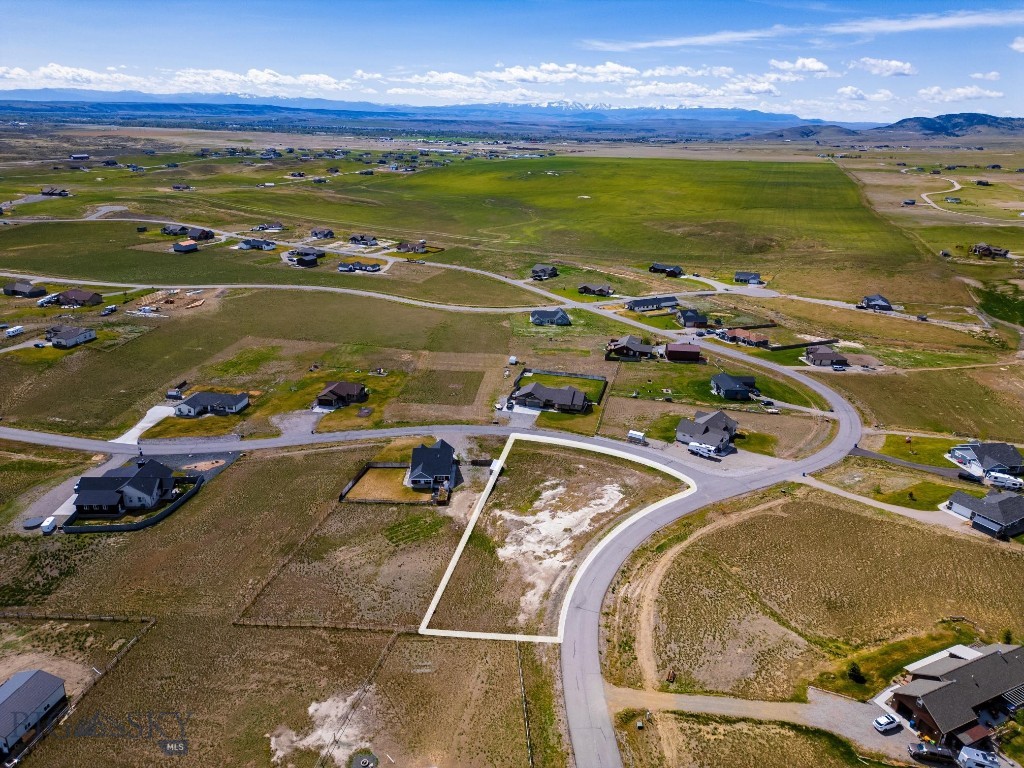 This 1.19-acre buildable lot in Three Forks, Montana offers one of the best values in the market — and may be the lowest-priced lot this developed subdivision has seen in years.

Located in The Village at Elk Ridge in Broadwater County, this property gives you a chance to own a ready-to-develop homesite with mountain views, paved road access, and a quiet Montana setting without paying Bozeman prices. Whether you are looking to build your full-time home, a Montana getaway, or hold land in one of the region’s growing markets, this lot checks a lot of boxes.

The subdivision offers a peaceful residential feel with great community amenities, including a park with a covered gazebo, picnic areas, a basketball court, baseball and soccer fields, plus approximately 25 acres of open space.

Three Forks puts you in a central location with easy drives to Bozeman, Butte, and Helena, making it convenient for work, supplies, shopping, dining, and airport access. Locally, you are close to some of Montana’s best outdoor recreation, including Copper City Mountain Biking Trails, Missouri Headwaters State Park, the Jefferson, Madison, and Gallatin Rivers, Canyon Ferry Reservoir, Bridger Bowl Ski Area, and Big Sky Resort.