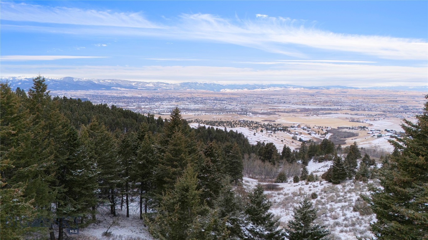 20.03 acres along the southwest slope of the Bridger Mountains, this property offers a rare balance of privacy, access and proximity, just 10 minutes from downtown Bozeman.

The homesite captures wide, unobstructed views across the Gallatin Valley, stretching to the Tobacco Root Mountains, Madison Range and beyond. The setting feels quiet and grounded, with open space, natural terrain and frequent wildlife including deer, wild turkeys, moose and elk.

A private walking easement provides direct access to more than 71,000 acres of nearby National Forest and State Land, offering immediate connection to some of the area’s best recreation, right from the property.

While the previous septic approval has expired, it remains a useful reference for future planning. Buyers are encouraged to review all available supplements and verify details to their satisfaction.

There are no restrictive covenants, allowing flexibility in how the property is used and developed.

This is a property where the strength is in the land itself ... location, access, and long-range views ... offering a solid foundation whether you choose to build now or hold for the future. Opportunities like this, with this level of privacy and proximity to Bozeman, are increasingly difficult to find.
