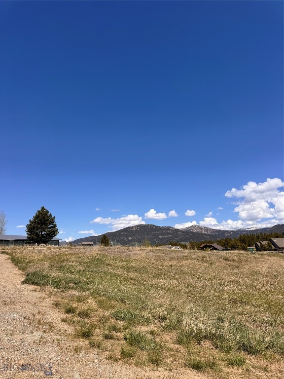 Escape to the breathtaking beauty of Hebgen Lake Montana with this land listing that promises a paradise for recreation enthusiasts. 
With the stunning backdrop of the Rocky Mountains, this lot offers you the opportunity to build your dream home.
Whether you are an avid fisherman, water sports enthusiast, like to snowmobile, hike or bike this property is a year round haven for outdoor lovers.
Take advantage of down hill  skiing in Big Sky Montana and the cross country ski trails of West Yellowstone, not to forget that the west entrance to Yellowstone National Park is a close 15 mile drive from the lot.
Create your personal haven in this recreational paradise.