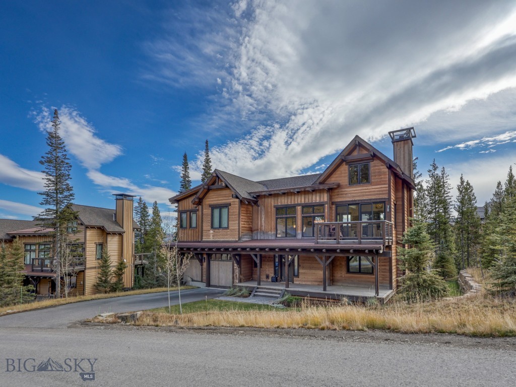 Experience the pinnacle of mountain living at The Highlands, the premier ski-accessible neighborhood within the exclusive Spanish Peaks Mountain Club. Perfectly positioned atop of the community, this impeccably maintained 4-bedroom, 4.5-bath retreat blends luxury, privacy, and effortless access to Big Sky’s world-class recreation.

Enjoy direct ski-in/ski-out convenience from a groomed trail just steps from your door and sweeping mountain views overlooking Spanish Peaks and the Montage Big Sky. Inside, an open-concept design with vaulted ceilings, a striking stone fireplace, and expansive windows creates a warm, inviting space for gathering. Multiple decks and a private hot tub invite relaxation amid the mountain scenery year-round.

Ownership includes access to the premier amenities of Spanish Peaks Mountain Club— ski terrain, two golf courses (with membership), fitness and recreation centers, pools, tennis and pickleball courts, and exceptional dining. Homeowners also enjoy preferred access to the five-star offerings of Montage Big Sky and the forthcoming Aspire Lodge—a 28,000-square-foot amenity center featuring dining, pools, fitness facilities, and more, opening in early 2026.

Whether you’re seeking an elegant mountain getaway or a year-round retreat, 146 Outlook Loop delivers unmatched access, style, and comfort in one of Big Sky’s most coveted locations.  Sold furnished

Membership at Spanish Peaks Mountain Club required upon closing.