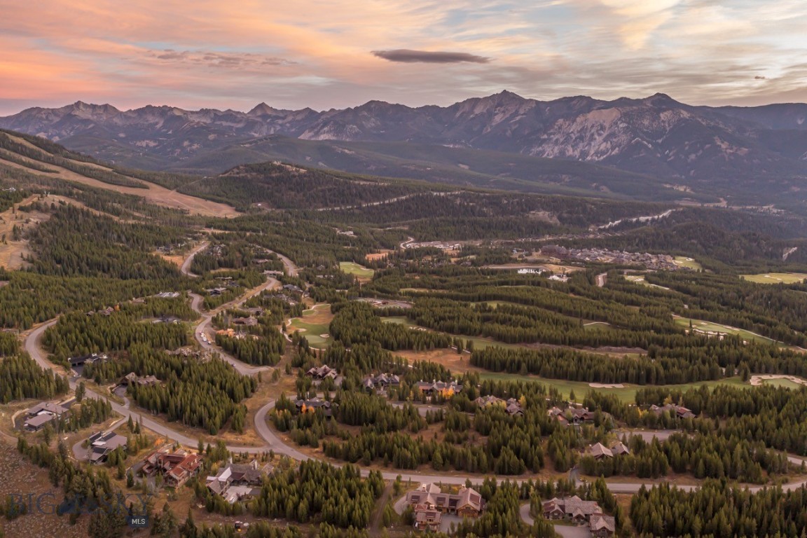 This premier ski-in/ski-out homesite is not to be missed. Homesite 76 on Eagle View Trail offers a rare opportunity to build a custom mountain home within Spanish Peaks Mountain Club, one of Big Sky, Montana’s premier private ski and golf communities. Ideally positioned in the heart of the Club, this gently sloped, ski-accessible lot captures breathtaking, unobstructed views of the Spanish Peaks and surrounding mountain landscape. The homesite’s orientation provides the perfect setting for a contemporary mountain design emphasizing natural light, outdoor living, and seamless indoor-outdoor flow.

Residents of Spanish Peaks Mountain Club enjoy an unmatched lifestyle defined by recreation, refined service, and community connection. Amenities include the private Tom Weiskopf Signature Golf Course, Tom’s Ten Par-3 course, direct ski access to Big Sky Resort, a scenic Nordic trail system, and the Spanish Peaks Clubhouse featuring elevated dining, a fitness center, outdoor pool, paddlesports facility, and member concierge services. Families and guests also enjoy Fort Peaks youth programs, seasonal events, and exclusive privileges at Montage Big Sky.

This location offers both privacy and accessibility—just a short drive to the Yellowstone Club and Big Sky Town Center for dining, shopping, and entertainment. The homesite is 15 minutes from the world-renowned Gallatin River, famous for its blue-ribbon trout fishing, and roughly an hour from downtown Bozeman, Yellowstone International Airport, and Yellowstone National Park. 

Whether building a year-round residence or a seasonal mountain retreat, this property provides a rare opportunity to invest in Big Sky’s most sought-after private community and embrace the best of Montana’s mountain lifestyle.