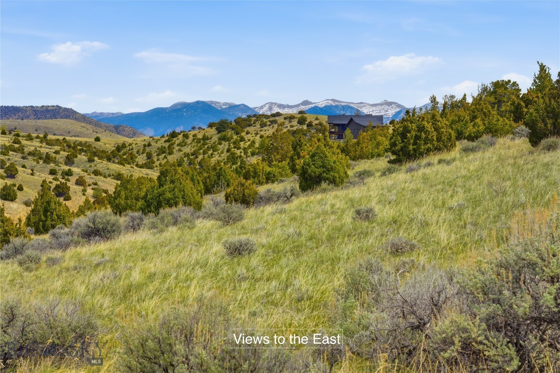 Located in Gallatin River Ranch, this gently sloping 20+/- lot is ideal for horses and offers an exceptional setting for your Montana dream home. Enjoy practically end-of-road privacy with only one potential homesite between this property and the road’s end, creating a peaceful and secluded setting. The property is perfectly positioned to appreciate beautiful views of the Bridger Range and surrounding countryside. Power runs the length of property, making it an affordable build site. Rare parcel that has little common area, so you are spoiled for choice where you build! 

Neighborhood owners and their guests enjoy exclusive access to approximately 2.5 miles of Gallatin River frontage, providing outstanding fly fishing, recreation, and peaceful riverside enjoyment. Whether you are looking for an equestrian property, recreational retreat, or the perfect homesite, this property captures the best of Montana living. Some pictures are of nieghborhood amentities and not taken from parcel.