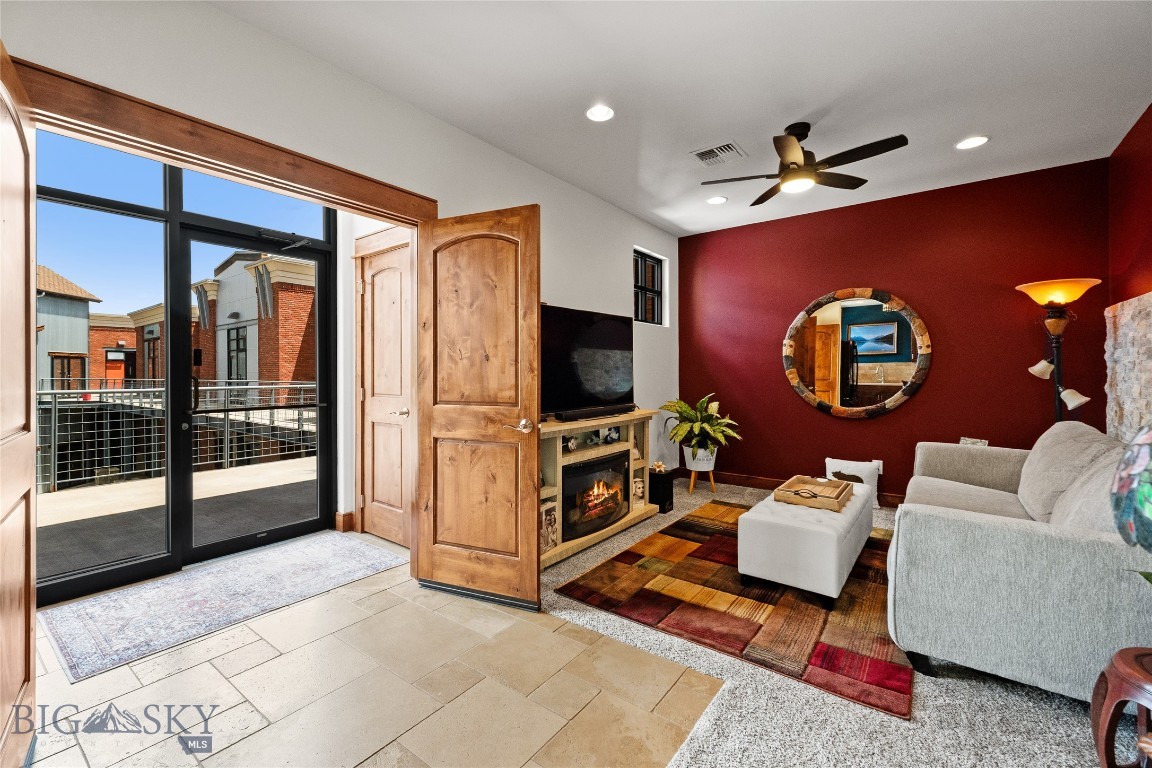 Enjoy low-maintenance living within minutes of Bozeman in the heart of Manhattan, Montana! This beautifully finished condo features 9-foot ceilings, quality craftsmanship throughout, including alder cabinetry and trim, quartz countertops, tiled showers, upgraded fixtures, and a striking stone accent wall. Air conditioning provides year-round comfort, while easy off-street parking adds everyday convenience.

Short-term rentals are allowed, creating an excellent opportunity for investors, second-home owners, or those seeking a lock-and-leave Montana retreat.

Located just one block from downtown Manhattan, you'll enjoy easy access to local restaurants, breweries, bars, grocery shopping, parks, and community events. Enjoy the convenience of a central Gallatin Valley location with quick and easy access to both Bozeman and Bozeman Yellowstone International Airport.

Whether you're chasing blue-ribbon trout on the nearby Gallatin, Madison, or Missouri rivers, skiing at Big Sky Resort, exploring Yellowstone National Park, hiking countless mountain trails, or simply enjoying Montana's outdoor lifestyle, this location puts it all within reach. 

A rare opportunity to own a well-appointed condo in one of the fastest-growing and most desirable regions in the West.
