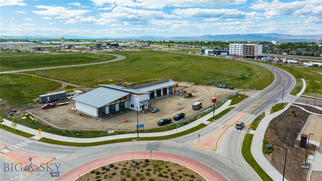 WEST POST is now offering commercial lots for sale at the I-90 Airport Interchange at Airway Boulevard and Frank Road in Belgrade, MT, just 6 miles west of Bozeman. The recently completed Frank Road will become the primary East/West connector to Jackrabbit Lane/US 191. This premier commercial development, with lots now under construction, is located within Belgrade City limits, providing all utilities and city services to the development. Phase 1 of WEST POST will have 36 lots and pad sites ranging from 0.7 to 6.2 acres, fully entitled for mixed-use development, with ideal sites for: hotels; restaurants; retail stores; offices; light industrial buildings; medical offices and many other uses. WEST POST is located less than a mile south of the Bozeman Yellowstone International Airport, and adjacent to the I-90 Interchange.  Block 1 Lot 2 has great I-90 visibility, and would be ideal for restaurant, retail, etc.