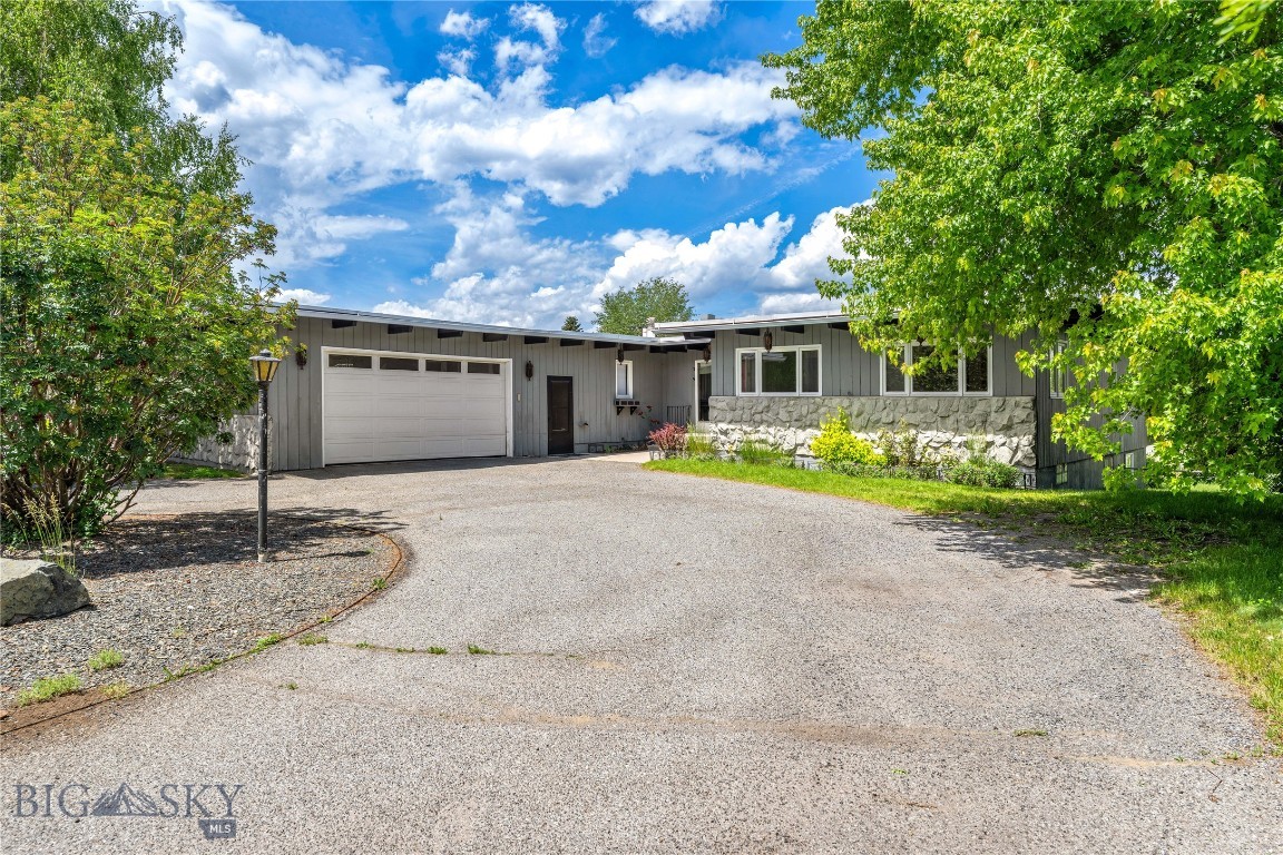 Welcome to your new home in the greater Butte Country Club area! This Mid-Century styled home offers an expansive floor plan over two levels with many updates that will be sure to leave you smiling. Pride of ownership is apparent when you stroll through the expansive 13,500 SF lot with mature landscaping, beautiful perennials, and the perfect full span deck to entertain or simply relax on. 

The main floor offers updated tile flooring in the foyer that leads to a fully upgraded kitchen, complete with soft close cabinetry and eat-in dining space. You’ll also find a dedicated laundry room on your way to the breezeway that leads to your double car garage. The airy living room is filled with natural light through newly upgraded Anderson windows, a wood burning fireplace, and original exposed beam ceilings. The primary bedroom with ensuite has its own private entrance to the porch and an attached ensuite bathroom that has been nicely updated in the recent past. Two additional bedrooms and a common bath round out the east wing. 

The walkout basement is built for company - whether it be event hosting or extended stays. The oversized family room includes another wood burning fireplace along with an attached kitchen, two bedrooms, and a bathroom rounding out the space. So whether it’s a holiday or the in-laws visiting, there’s space for everybody to live comfortably. 

Don’t let this one pass you by - schedule a private showing and see how you can make 3151 Quincy your forever home today!