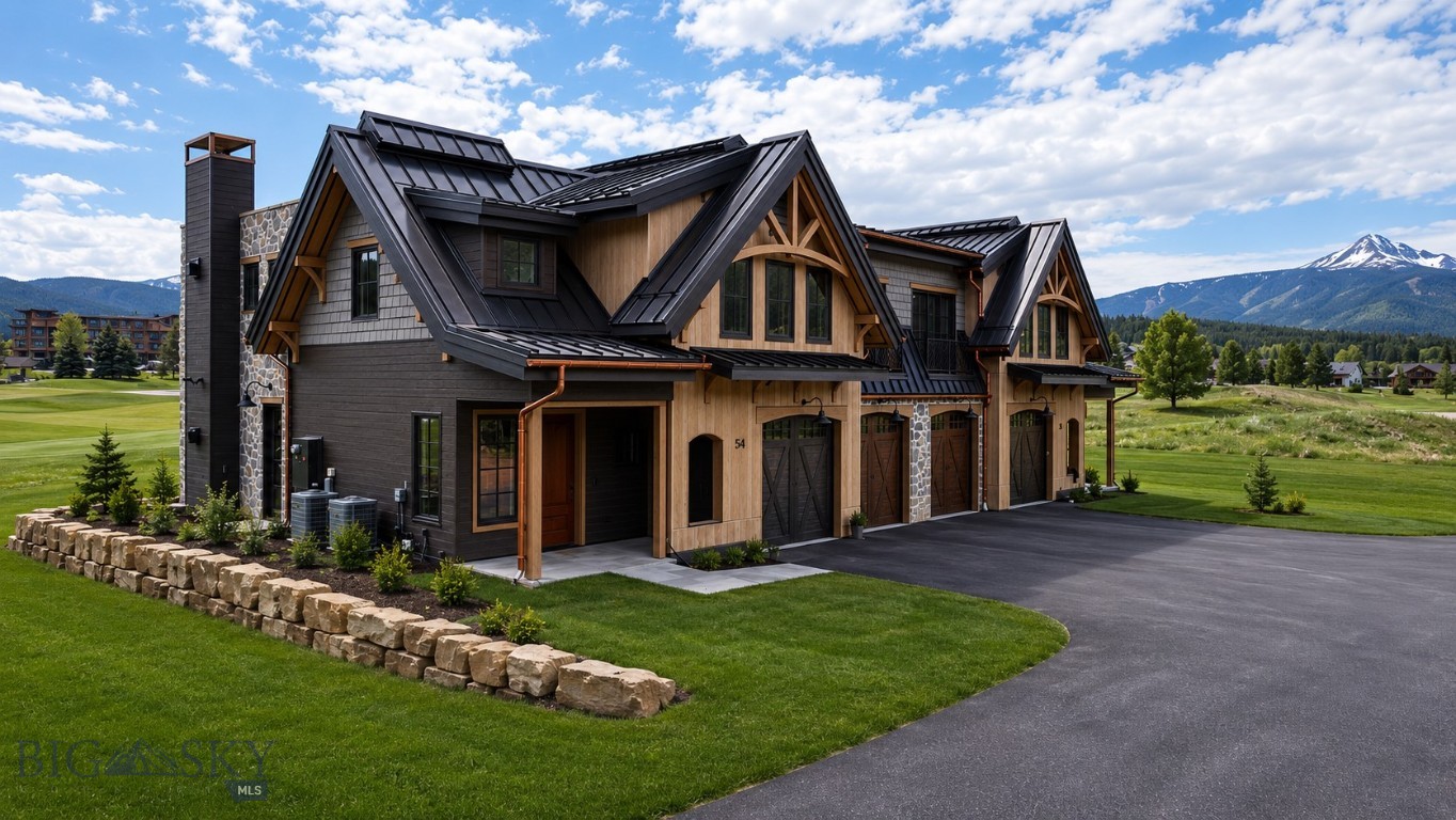 Introducing 38 Marmot at the Yellowtail Residences, a mountain-modern home in the heart of Big Sky's Meadow Village, scheduled for completion in late summer. Inspired by the quality and design of Big Sky's premier private club homes, this residence blends luxury finishes, thoughtful functionality, and an unbeatable location.
The exterior features natural stone, composite cedar shake siding, warm wood accents, copper gutters, Juliet balconies, and dramatic timber details. A private hot tub overlooks the Big Sky Golf Course and groomed Nordic ski trails, creating the perfect setting for year-round enjoyment. Designed for entertaining and everyday living, the open main level is anchored by a chef's kitchen featuring a 48-inch Thermador range with griddle, pot filler, dual dishwashers, two sinks, custom cabinetry, and herringbone hardwood flooring. Additional upgrades include Lutron lighting controls, air conditioning, whole-home humidification, Cat-6 wiring, and custom mudroom storage.
The primary suite offers a gas fireplace, custom walk-in closet, and a spa-inspired bath with a soaking tub, steam shower, radiant heated floors, and separate water closet. Upstairs guest suites each feature private en-suite bathrooms with heated floors and custom wardrobes.
Additional highlights include a laundry room with dual washers, utility sink, ample storage, and folding station, plus a heated two-car garage with epoxy flooring, hot and cold water, and an ultra-quiet opener.
Located just minutes from Big Sky Resort and within walking distance of Meadow Village amenities, owners enjoy convenient access to golf, Nordic skiing, dining, shopping, live music, and community events.
This residence is offered unfurnished. Furnished photos are provided for illustrative purposes only.
Scheduled for completion in late summer, 38 Marmot offers the opportunity to enjoy a brand-new luxury home just in time for Big Sky's fall colors and upcoming ski season.  Landscaping has been enhanced by AI.