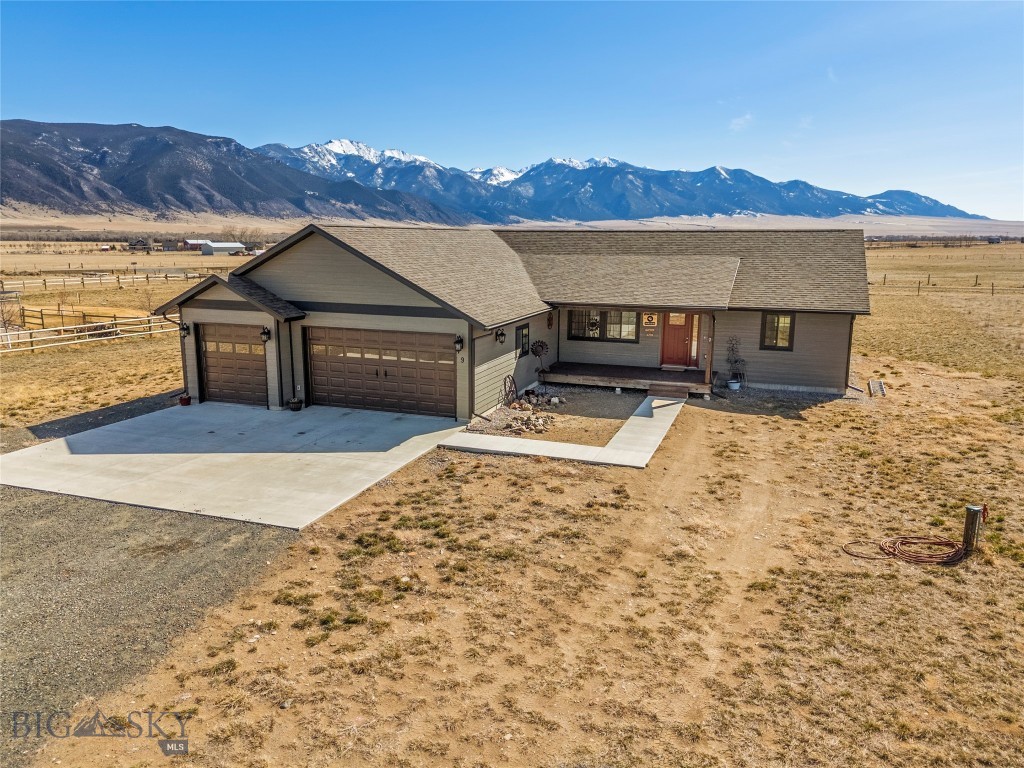 Welcome home to this beautifully designed, ADA-compliant residence in Whitehall, where comfort, quality, and breathtaking Montana views come together. Offering 1,740 square feet of thoughtfully planned single-level living, this exceptional home features three spacious bedrooms, two full bathrooms, and a convenient laundry area.

The oversized, insulated three-car attached garage provides ample space for vehicles, recreational equipment, and all your Montana toys. Outdoor living is equally impressive, with a welcoming 20' x 8' covered front porch and a stunning 24' x 16' stamped concrete patio, perfect for entertaining, relaxing, and creating lasting memories with family and friends.

Retreat to the luxurious primary suite, complete with a beautifully tiled walk-in shower and an expansive walk-in closet. Throughout the home, you'll find high-end finishes including granite countertops, custom knotty alder cabinetry, Andersen windows, knotty alder doors and trim, and a spacious pantry.

Designed with efficiency and low-maintenance living in mind, the home features a constant-pressure well pump, instant hot water return system, durable LP SmartSide siding, and 40-year shingles for long-term peace of mind.

With quality craftsmanship at every turn and panoramic views in every direction, this move-in-ready property offers the perfect blend of functionality, comfort, and Montana charm. Don't miss the opportunity to make this exceptional Whitehall home your own.