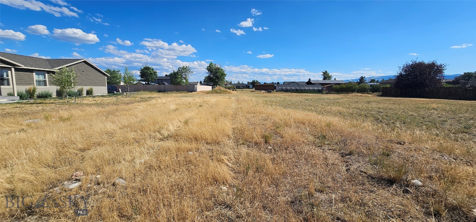 Rare Multi-Family Lot in Ennis!

A unique development opportunity in one of Montana’s most desirable small towns! This .211 acre level lot is zoned for multi-family use and located within the town limits of Ennis, offering outstanding potential for investment, rental income, or a custom duplex or triplex build.

Property Highlights:

Zoned for Multi-Family – Perfect for duplex or triplex

Fully Serviced – City water, sewer, and electricity available at the street—ready for hookup

Prime Location – Walkable to Ennis Schools, hospital, grocery store, restaurants, and Main Street shopping

Outdoor Access – Minutes from the Madison River and Lions Park for fishing, hiking, and recreation

Multi-family lots like this are extremely rare in Ennis—don’t miss your chance to build income-generating housing or your ideal home with rental potential in a growing, vibrant community