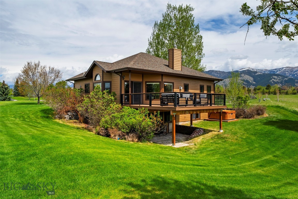 Set in the coveted Summer Ridge Subdivision in North Bozeman, 1028 Summer Ridge Road offers the rare combination of privacy, space, and seamless access to the very best of Bozeman living. Perched on just over an acre in the Bridger foothills, this 4+-bedroom, 3-bathroom home enjoys views, adjacent community trail system, nearby access to Bridger Mountains recreation, and the convenience of being just 15 minutes from downtown Bozeman. Designed with both comfort and functionality in mind, the main level features an spacious open-concept kitchen, living and dining with a gas fireplace fo warmth and aesthetics. These living areas are highlighted with abundant natural light and beautifully refinished hardwood flooring. Step directly onto the newly built deck to take in Bridger views to the east as you grill and neighboring green space to the south and west, creating a peaceful and private setting for entertaining or everyday living. The primary suite is conveniently located on the main floor and includes a walk-in closet along with a well-appointed ensuite bathroom featuring a soaking tub, tiled shower, and separate water closet. An additional bedroom and office (with the closet and egress) and full bathroom complete the main level layout, all replenished with brand new carpeting. Downstairs, the walk-out basement offers exceptional flexibility with a large family room, two generously sized bedrooms, a full bathroom, gas stove, and a designated laundry room with ample storage space. Brand-new carpet installed in April 2026 has never been lived on, providing a fresh and updated feel throughout the both levels. Additional highlights include a 2-car garage and extensive driveway space ideal for parking recreational vehicles or additional parking. Opportunities to own in Summer Ridge are limited, and this property captures everything that makes this neighborhood one of Bozeman’s most sought-after communities.
