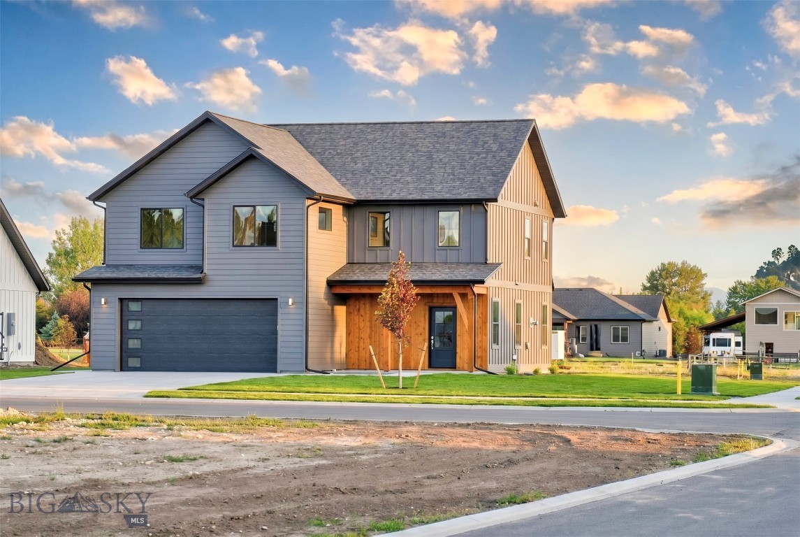 Positioned on a large corner lot in Gallatin Meadows with beautiful Bridger Mountain views, this thoughtfully designed new construction home offers a welcoming layout, clean lines, and carefully selected finishes that make everyday living feel easy and comfortable. Fully landscaped and fenced, the property offers a move in ready experience with inviting indoor and outdoor spaces alike. The main level features an open floor plan connecting the kitchen, dining, and living areas, creating a space that feels bright, functional, and inviting without feeling oversized. The kitchen is thoughtfully finished with quartz countertops, a generous island, stainless steel appliances, ample cabinetry, and a spacious pantry. A gas fireplace adds warmth and character to the living area, while a convenient powder bath just off the mudroom adds everyday practicality. Upstairs, the home features three bedrooms plus a versatile flex space ideal for a second living area, office space, playroom, or reading nook. The spacious primary suite includes dual vanities, a beautifully tiled shower, and plenty of natural light, while an additional full bathroom serves the remaining bedrooms. Additional highlights include a two car garage, a functional mudroom with built in bench and cubbies, a covered front porch, and a back patio perfect for enjoying Montana evenings and the surrounding mountain views. Located in Gallatin Meadows, a growing community known for its convenient location and access to the outdoor lifestyle that defines the Gallatin Valley, this home is just a short drive from Bozeman Yellowstone International Airport, Big Sky, hiking, skiing, fishing, and all that Bozeman has to offer year round.