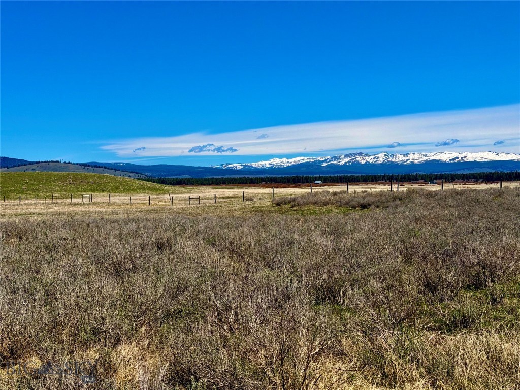 Lovely Lot for you to Build Your Summer Season Getaway Cabin Home!  AND Only 9 Miles to Iconic Yellowstone National Park!  Mountain Views in All directions, All Year Creek,  and Close to Amazing Hebgen Lake.  Enjoy Endless Outdoor Adventure- Flyfishing, Hiking, Biking, Wildlife, Sightseeing, and More. Seasonal Access Only.  And Short-term Vacation Rental is an Option!
