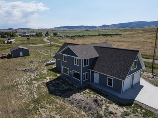 This new construction is the perfect home or retreat with so many amenities!  Situated on the edge of town with views of the Park Hills, Castle Mountains & the Smith River.  The fully furnished home has a main floor master bedroom & 2 bedrooms upstairs. It is finished with whitewashed red pine, thoughtful details including recessed lighting, a large walk in pantry, 2 large bunk rooms for additional sleeping, storage or dens, an open floor plan and several heat sources including 2 wall mounted Gree electric heat/air conditioners, 2 free standing propane stoves, infloor hydronic heat w/electric boiler & electric baseboard upstairs.  An attached 2 car garage, second floor deck, and a 24' x 32 shop. No covenants!
The property is a vacation rental home, it is managed by Evolve and can be found on several websites.