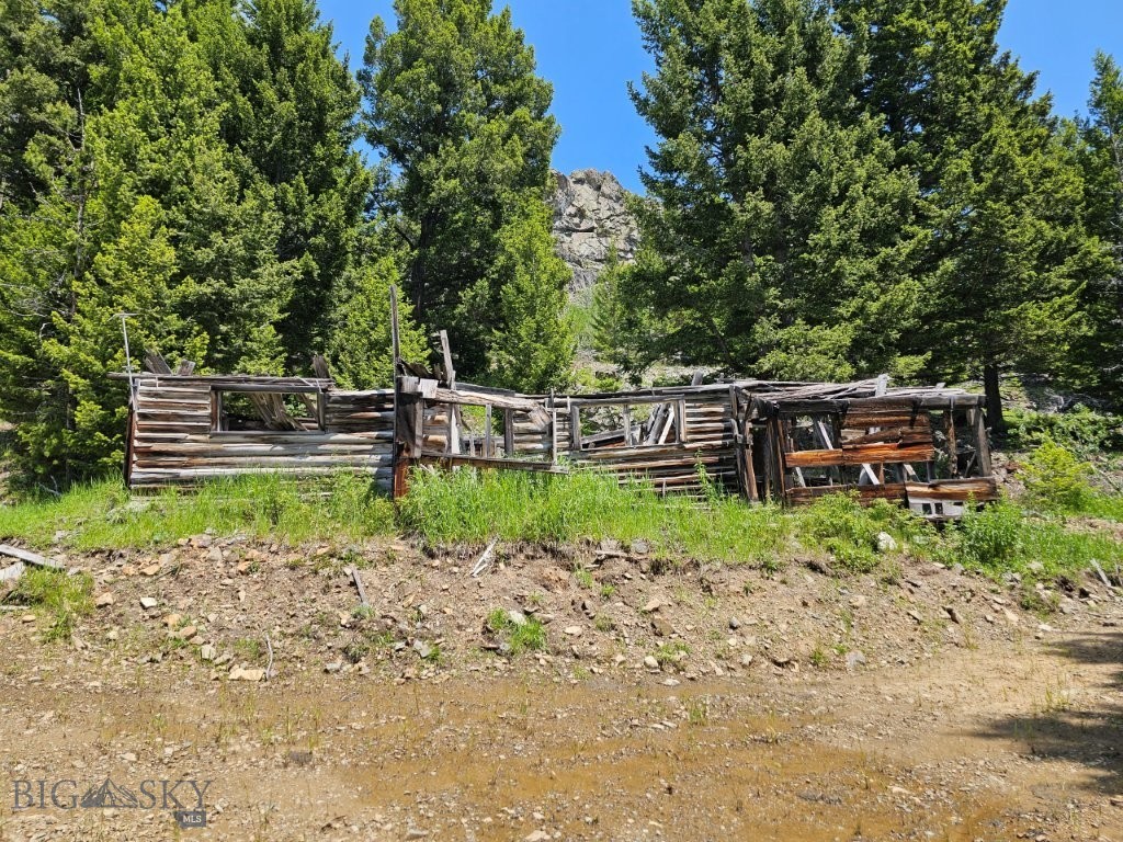 8.9 Acres of Montana land with a creek in the middle of the National Forest in the Elkhorn Mountains with a cabin site, several old relic miners’ cabins, elk and deer hunting, camping, ATVing and more. It’s extremely rare to find land like this way out in the National Forest in the Elkhorn Mountains and one that has Indian Creek running right through it. There are leveled sites by the old miners’ cabins so you can pull your camper in and start enjoying the creek and the views immediately while you make plans to build that cabin in the mountains you’ve always wanted. Make sure you build it where you can hear and see Indian Creek and the old relic miners’ cabins. If only the cabins could tell stories of back in the day. And be sure to build a big deck on your cabin so you can sit out and listen to the babbling of the creek while the elk bugle in the fall and watch the sunsets over the Rocky Mountains. It’s ready to start planning and building your new Montana mountain cabin whenever you are. Or bring up that wall tent or camper and have that place on the Elkhorn Mountains of your very own that you and your family can enjoy and pass down through the generations. What a feeling to know you’ve always got a place in the mountains to go get away and relax and get back to nature that’s all yours. This property sits way out in the National Forest, where you can go in any direction and hunt, hike, and enjoy the tens of thousands of acres of National Forest all around you. It’s like you’re buying a whole lot more land with all this extra easily accessible National Forest right out your front door that’s yours to enjoy as well any time you take a notion. There are trails to hike, roads to drive or ATV, elk and deer to hunt, mountains to be climbed, and places to be explored, and it’s all close by within minutes of your new property in the mountains. It’s such an amazing bonus to have all this extra National Forest land right at your fingertips; you just can’t go wrong. The Elkhorn Mountains are renowned in Montana for their elk. They are plentiful, and the bulls grow big here in the Elkhorns. This is a special hunting district in Montana that’s designed specifically to grow mature bull elk. Set up your spotting scope and glass the elk while they graze in the open parks before heading into the timber-covered hillsides for the day. The Elkhorns are full of wildlife. The property is a recreational property. FS gate closed from December 2nd to May 15th winter range.