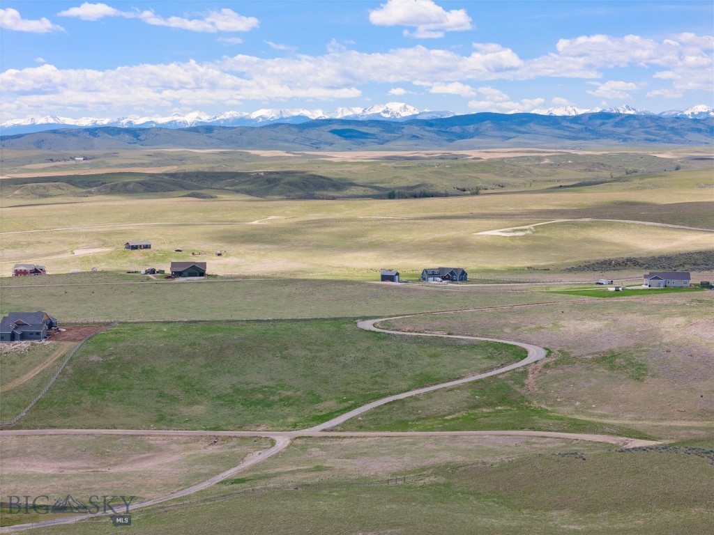 Priced Below Assessed Value!

Discover a rare 6.36-acre sanctuary in the exclusive Rolling Glen Ranch community, perfectly positioned on the edge of Three Forks, Montana. This isn’t just land; it’s your invitation to live in the Montana dream.
With panoramic mountain vistas stretching across your horizon, your custom home basks in the peace and privacy of a premium end-of-development location.

This expansive lot offers the freedom to build multiple structures, including a shop or studio tailored to your creative or mechanical pursuits. And the essentials? They’re already in place. Power is conveniently available at the lot line, and a shared driveway is ready to welcome you home, saving you time, money, and effort.

This is more than a piece of land; it’s a canvas for your Montana masterpiece. Seize the opportunity to craft a lifestyle with wide-open skies, natural beauty, and limitless potential.

Formerly known as 13 Morning Glory — but soon to be known as home.