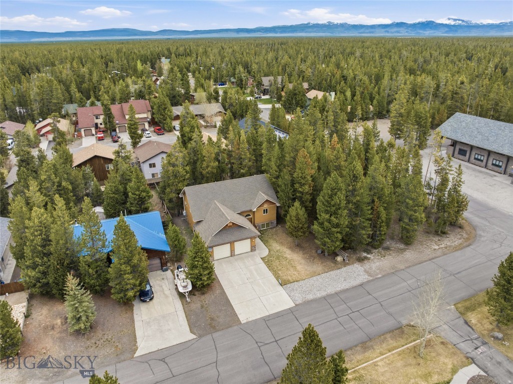 Luxury Home – Exceptional Opportunity in West Yellowstone – 

Discover a rare opportunity to own a stunning property in the heart of West Yellowstone, Montana.

The main residence offers 2,786 sq. ft. of thoughtfully designed living space, featuring 4 spacious bedrooms and 4 full bathrooms, ideal for comfortable living or hosting family and guests. The home showcases a bright and open layout, high-quality finishes, and a warm, inviting atmosphere that perfectly complements the surrounding natural beauty.

A 2-car garage provides convenience and ample storage, while the outdoor space offers room to relax and enjoy Montana’s breathtaking environment.

A separate and adjacent 0.25-acre buildable lot is available to the buyer of this home, providing incredible flexibility—whether you envision building a second home, a guest house, or simply preserving privacy and space.

Located just minutes from the entrance of Yellowstone National Park, this property combines location, lifestyle, and long-term value in one exceptional package.

Property Highlights:

4 Bedrooms | 4 Bathrooms
2,786 Sq Ft Living Space
2-Car Garage
Additional adjacent 0.25 Acre Buildable Lot available
Prime West Yellowstone Location
Surrounded by Nature & Year-Round Recreation
This is a rare chance to own a versatile and valuable property in one of Montana’s most sought-after destinations.

Use as a year-Round residence or your perfect vacation home.. 
Short-term or Vacation Rentals are not allowed in the Madison Addition.
ADJACENT LOT AVAILABLE FOR PURCHASE ONCE HOME IS SOLD! HOME BUYER HAS FIRST OPPORTUNITY.