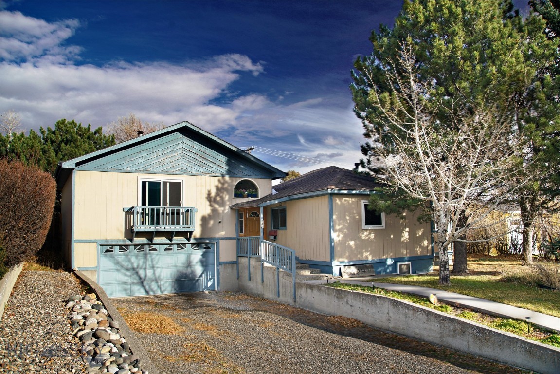 Are you looking for a vibrant active community with neighborly hospitality and authentic good-natured people? Then look no further. Welcome to Livingston, MT. A place where the residence will still give a helping hand to a stranger. The scenic beauty of Livingston is boundless and offers the community a year-round perpetual playground. The neighborhood of 624 N 2nd Street is situated on a bluff overlooking the city of Livingston with an astounding mountain backdrop. 
The heart of this 4-bedroom home is the elevated upper loft great room. It is expansive, and it includes a wood-burning stove in the center of the room for cozy warm winter days and nights. The front of the great room has a balcony, and the rear exits through sliders onto the back deck overlooking the widespread back yard. The yard includes food production from a chicken coop ready for your chickens, apple trees and a productive garden with Huckleberries, Choke Cherry's, Gooseberry's  Raspberry's  and a rotary composting bin. For relaxation there is a relaxation hut located off the back deck. The open-floor plan with separated private bedrooms lends itself to quiet seclusion for each bedroom. The kitchen has abundant counter space for prepping and cooking complex or gourmet meals. There is an extensive amount of parking In front of the garage, so bring your toys. 
The population of Livingston is approximately 9,000 people. Livingston is still considered the original gateway to Yellowstone National Park at only a 2 ½ hour drive. The property is minutes from downtown Livingston, and a convenient 30-minute drive to Bozeman. Sacajawea Park is a 5-minute drive, which includes a small lake, playground, tennis courts, skate park, swimming pool, picnic areas, civic center, Lewis and Clark Trail and Yellowstone River. Come for the outdoor activities, and stay for the warm and affectionate community.