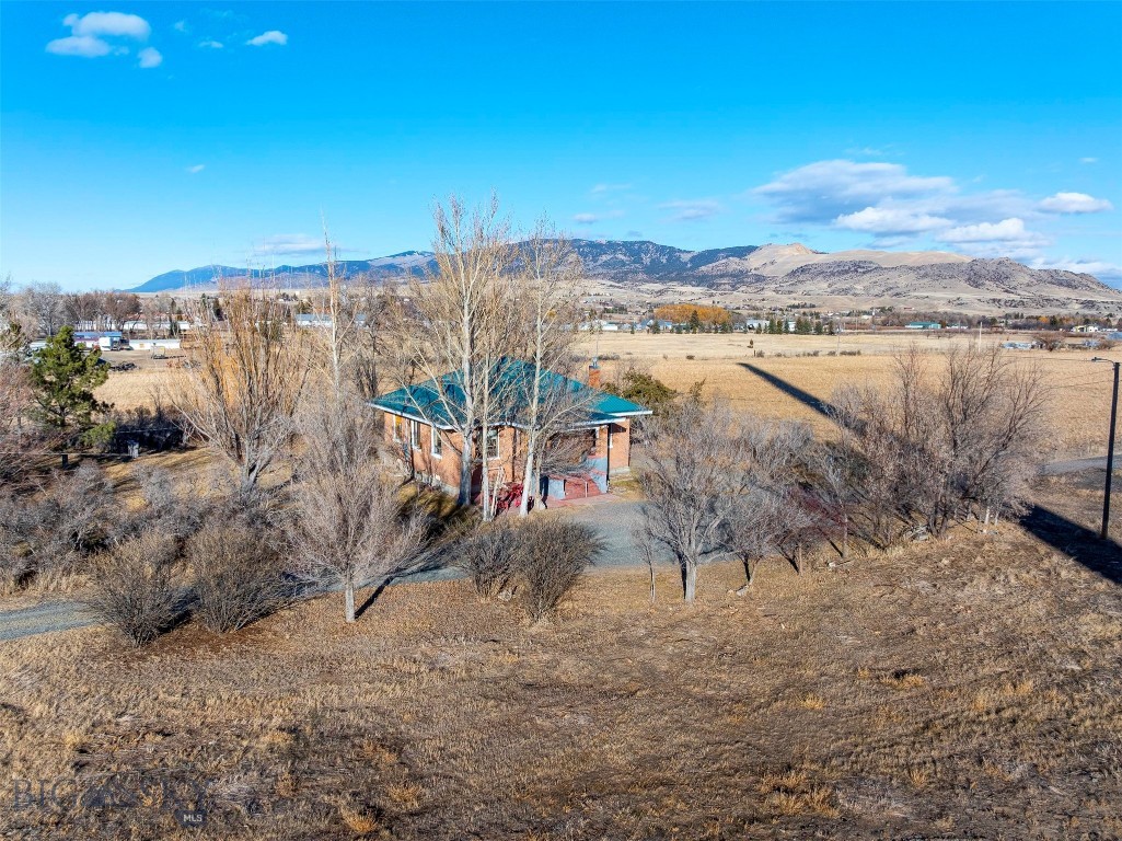 Investment opportunity meets historic charm! Located at 27 Sugar Beet Row, this unique 18.96-acre property is more than just a 3-bedroom home—it’s a blank canvas for your biggest ideas. With its historical ties to the old sugar factory and nearly 19 acres of lush land with water rights, the possibilities are endless. Transform this 'gem' into a premier Montana wedding venue, a high-demand Airbnb retreat, or a sustainable farmstead. With stunning views and a location that feels a world away yet close to Whitehall, this is the 'think outside the box' property you’ve been waiting for. Properties with this much character and acreage are a rare find!